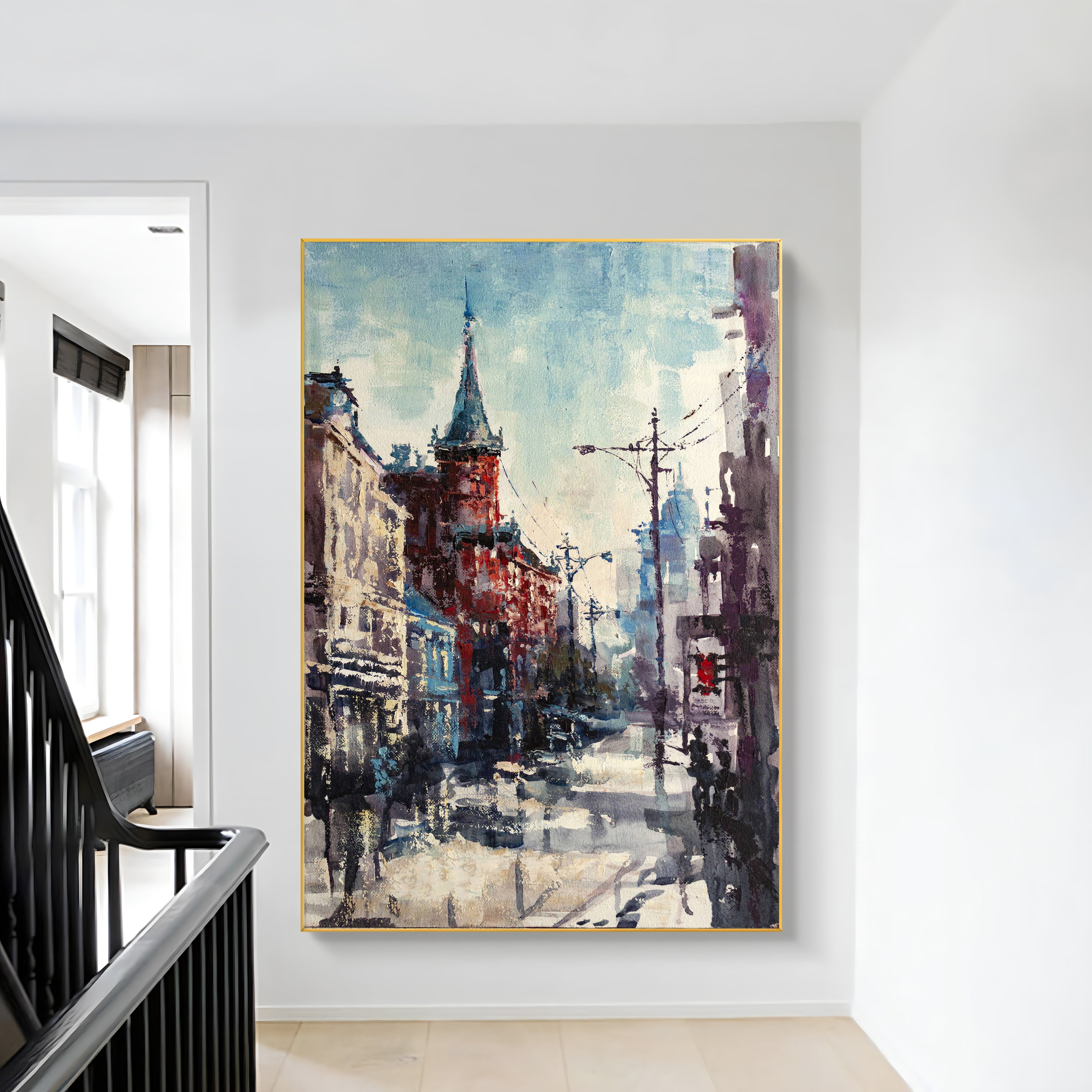 a painting hanging on a wall next to a stair case