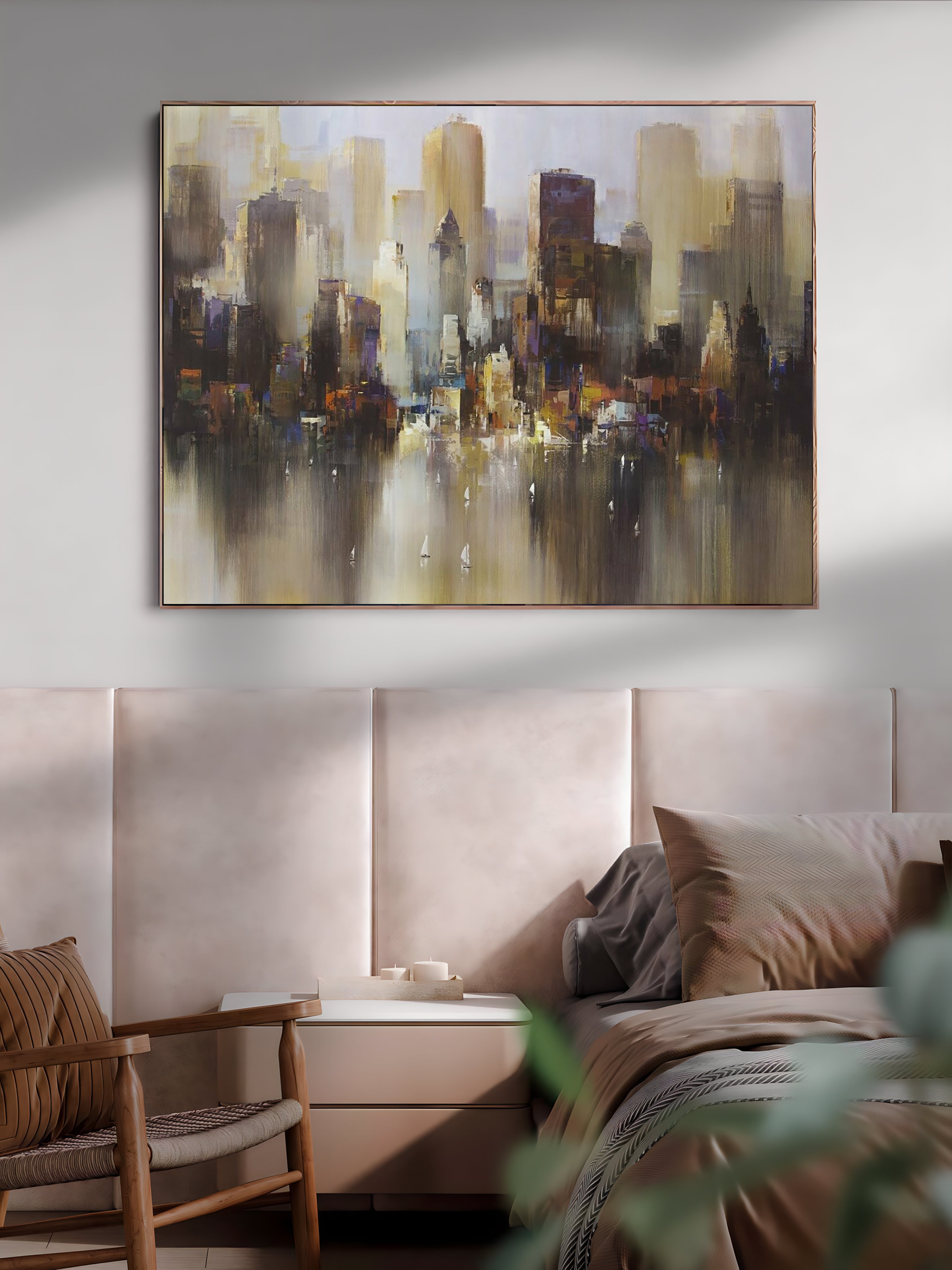 a painting of a cityscape hangs above a bed