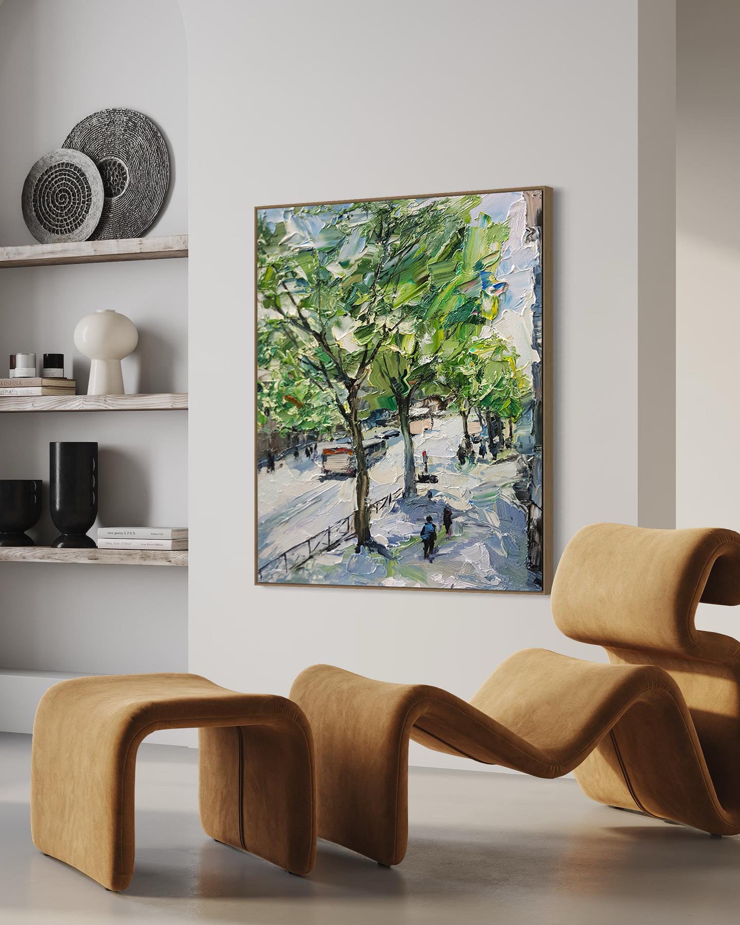 a painting hanging on a wall next to two chairs