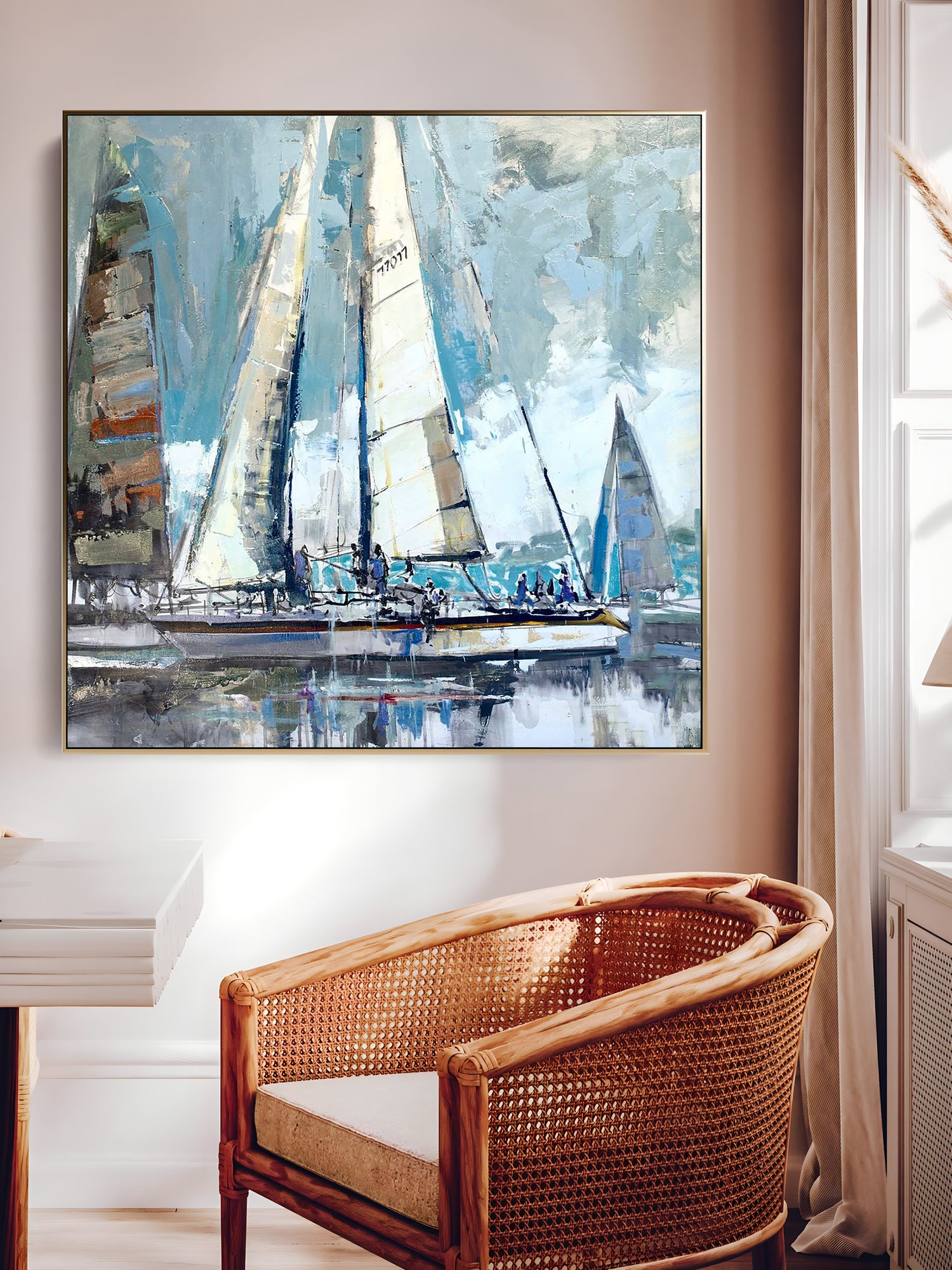 a painting of a sailboat in a living room