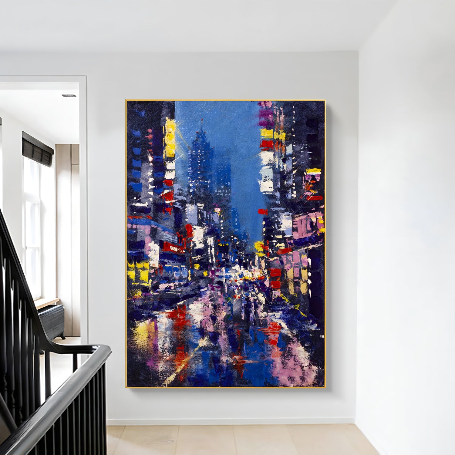 a painting hanging on a wall next to a stair case