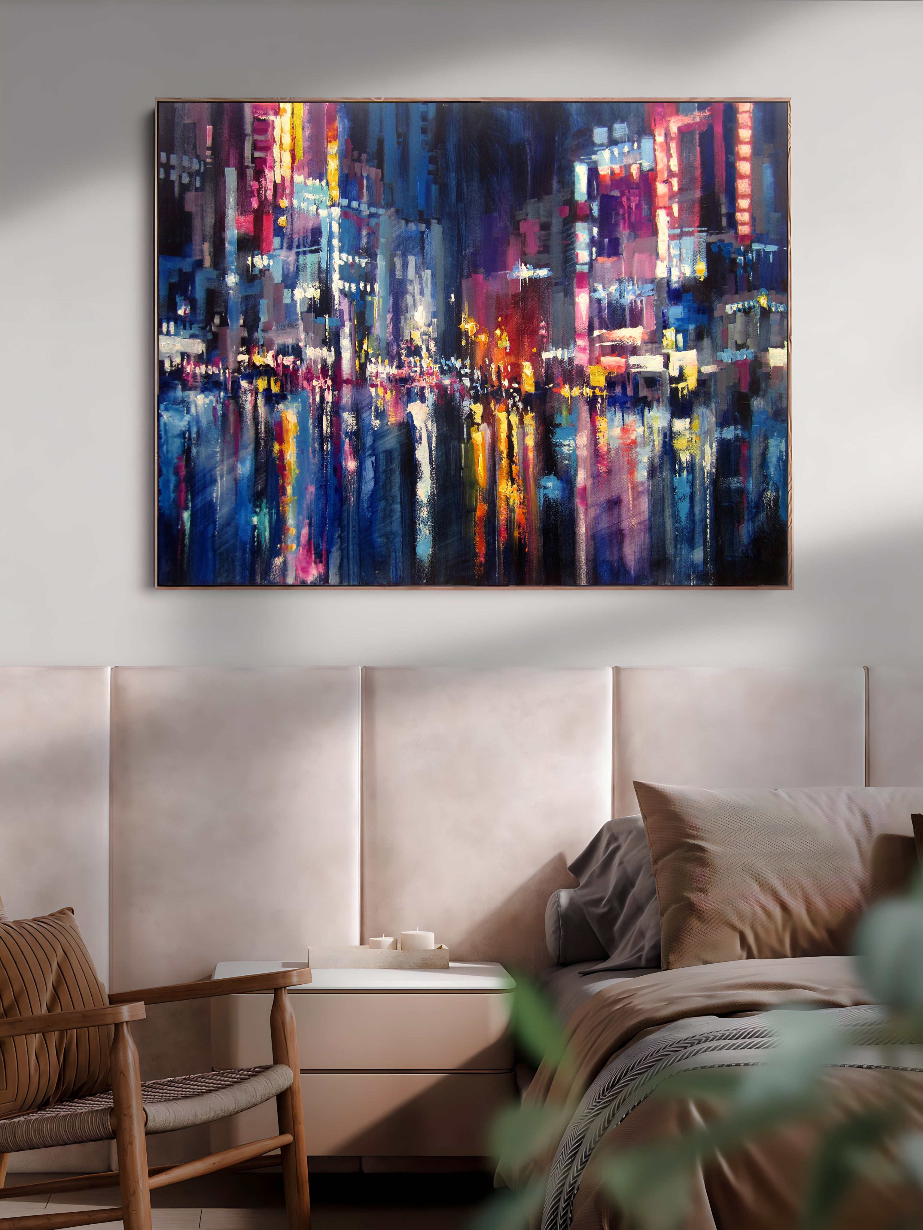 a painting of a cityscape is hanging above a bed