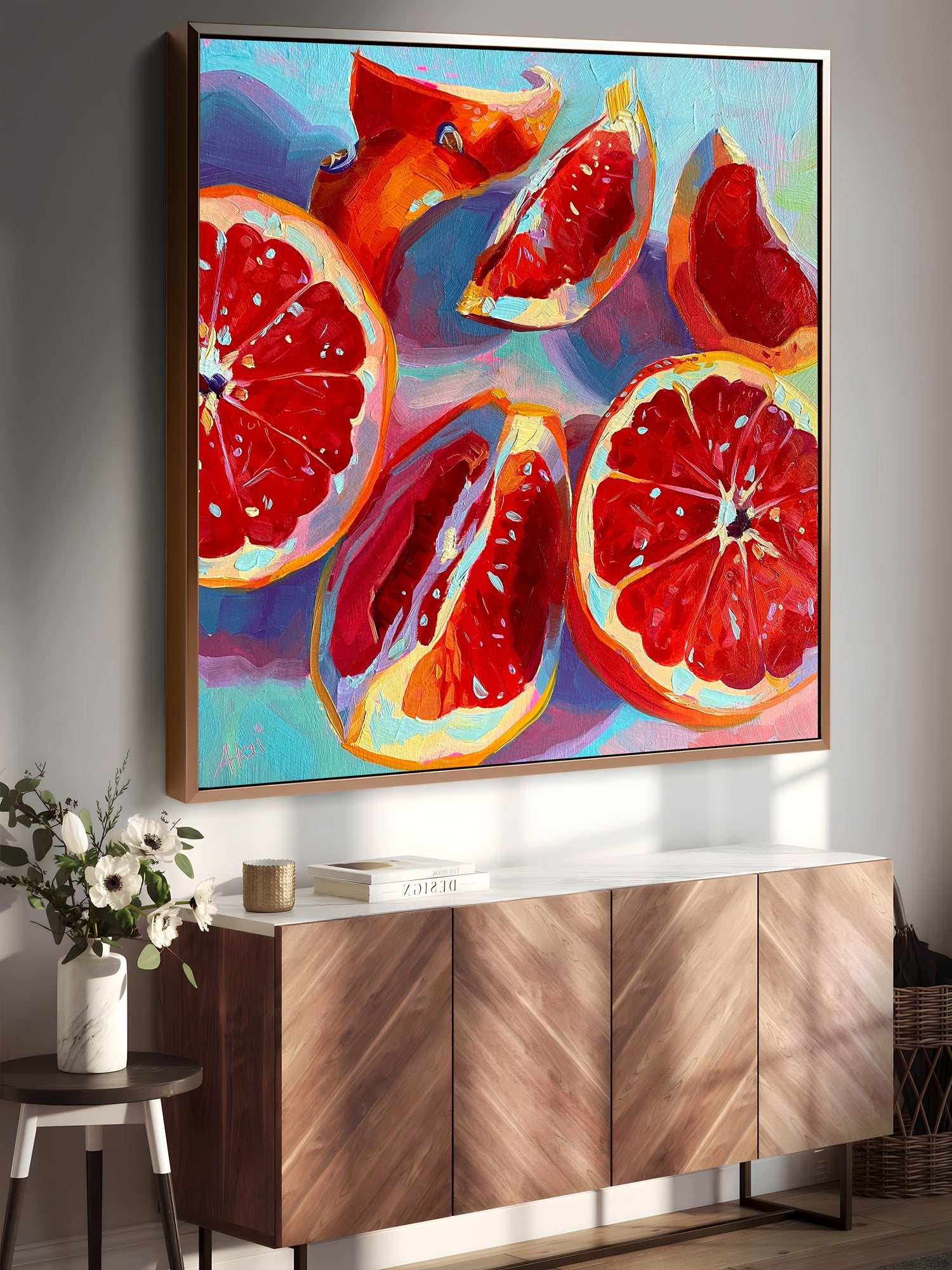 a painting of grapefruits on a wall