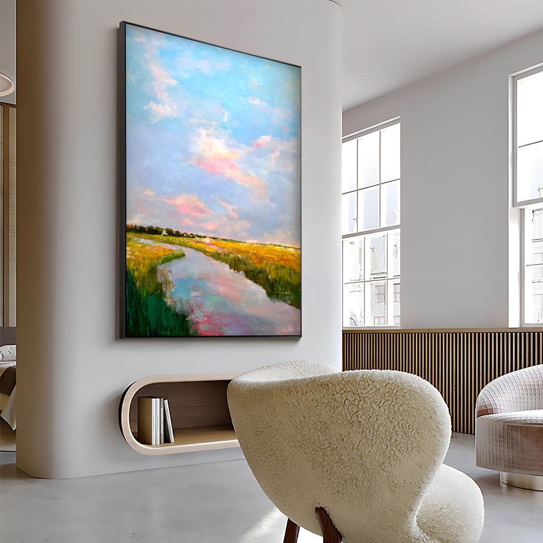 a living room with a large painting on the wall