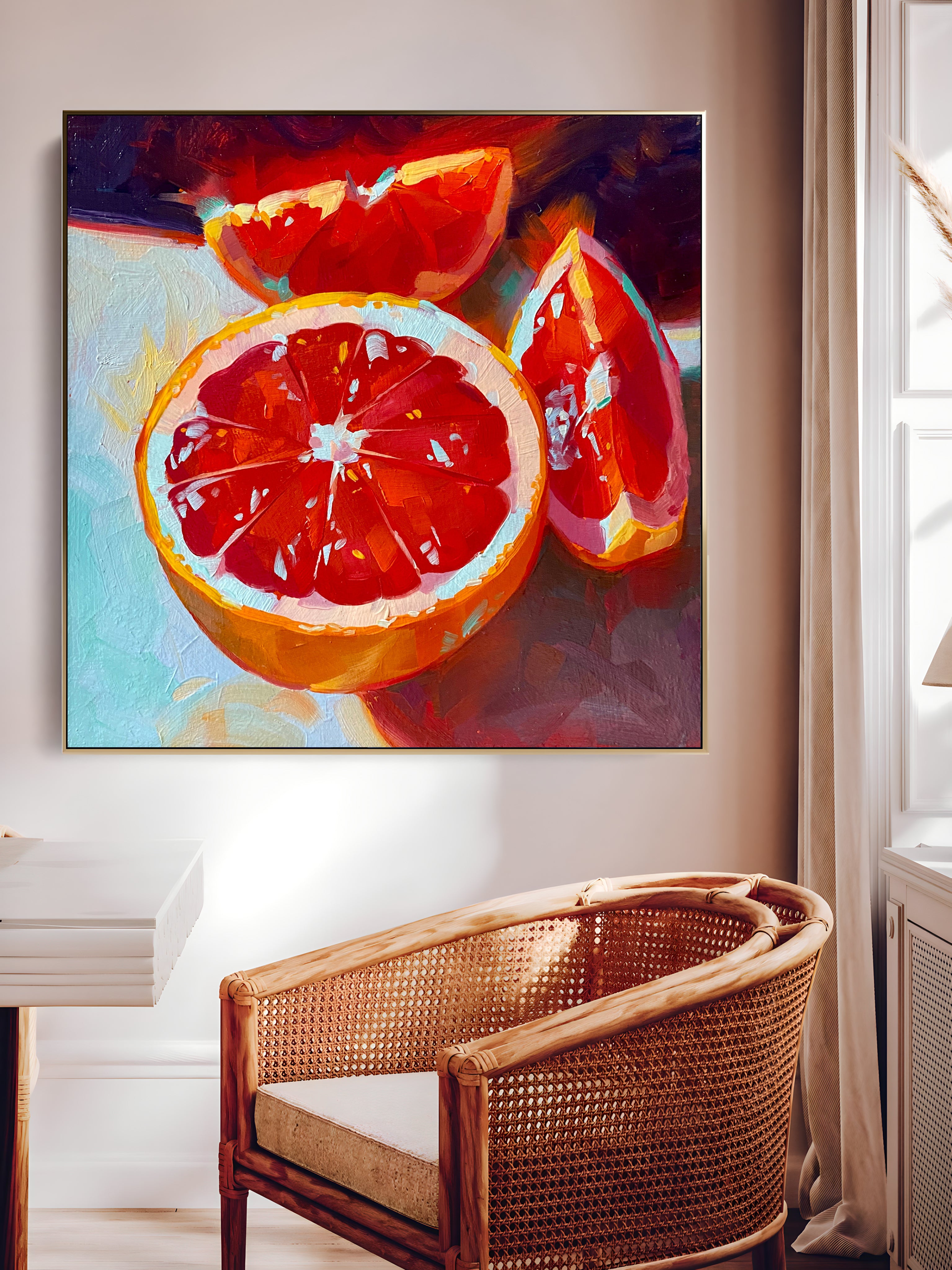 a painting of a grapefruit on a wall