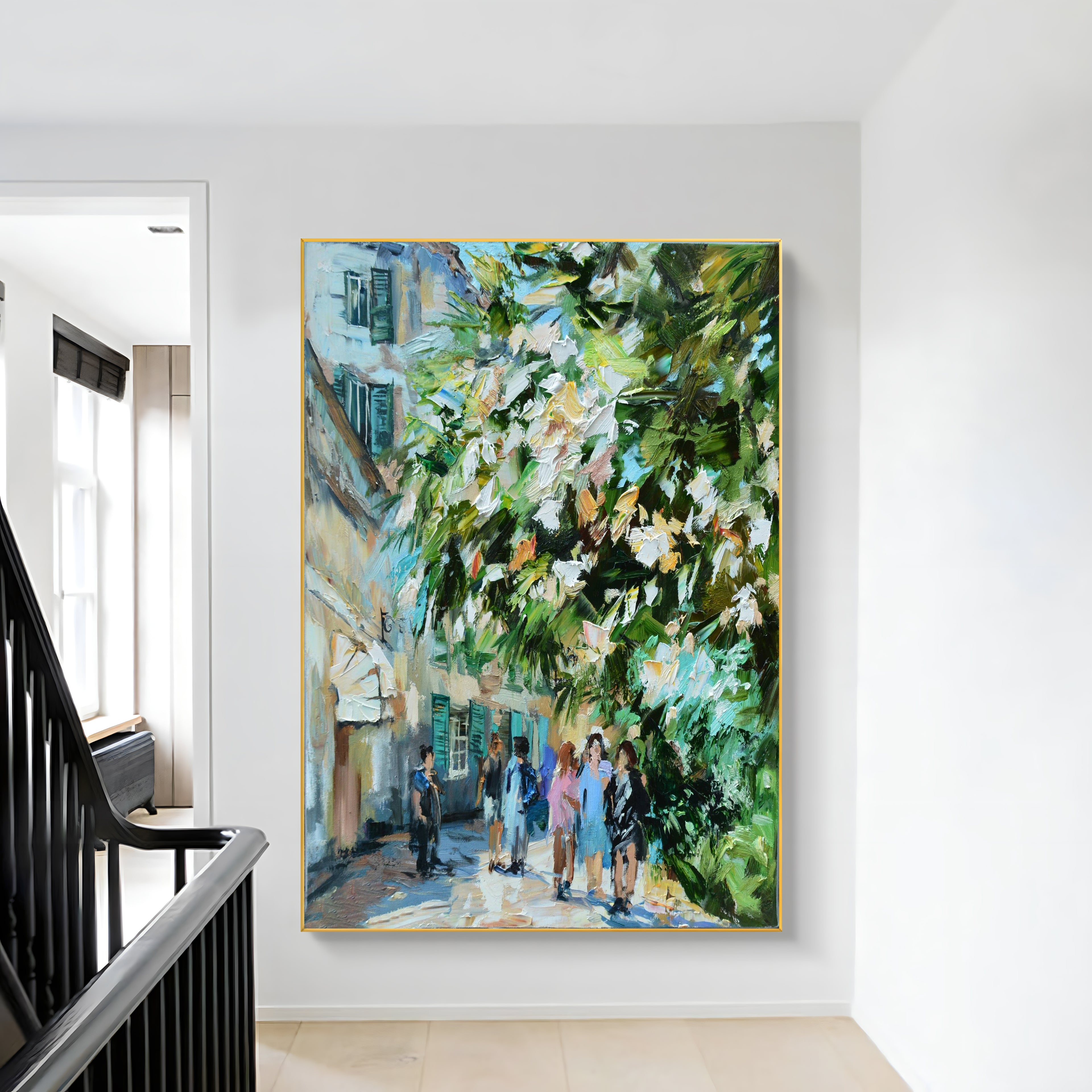 a painting hanging on a wall next to a stair case