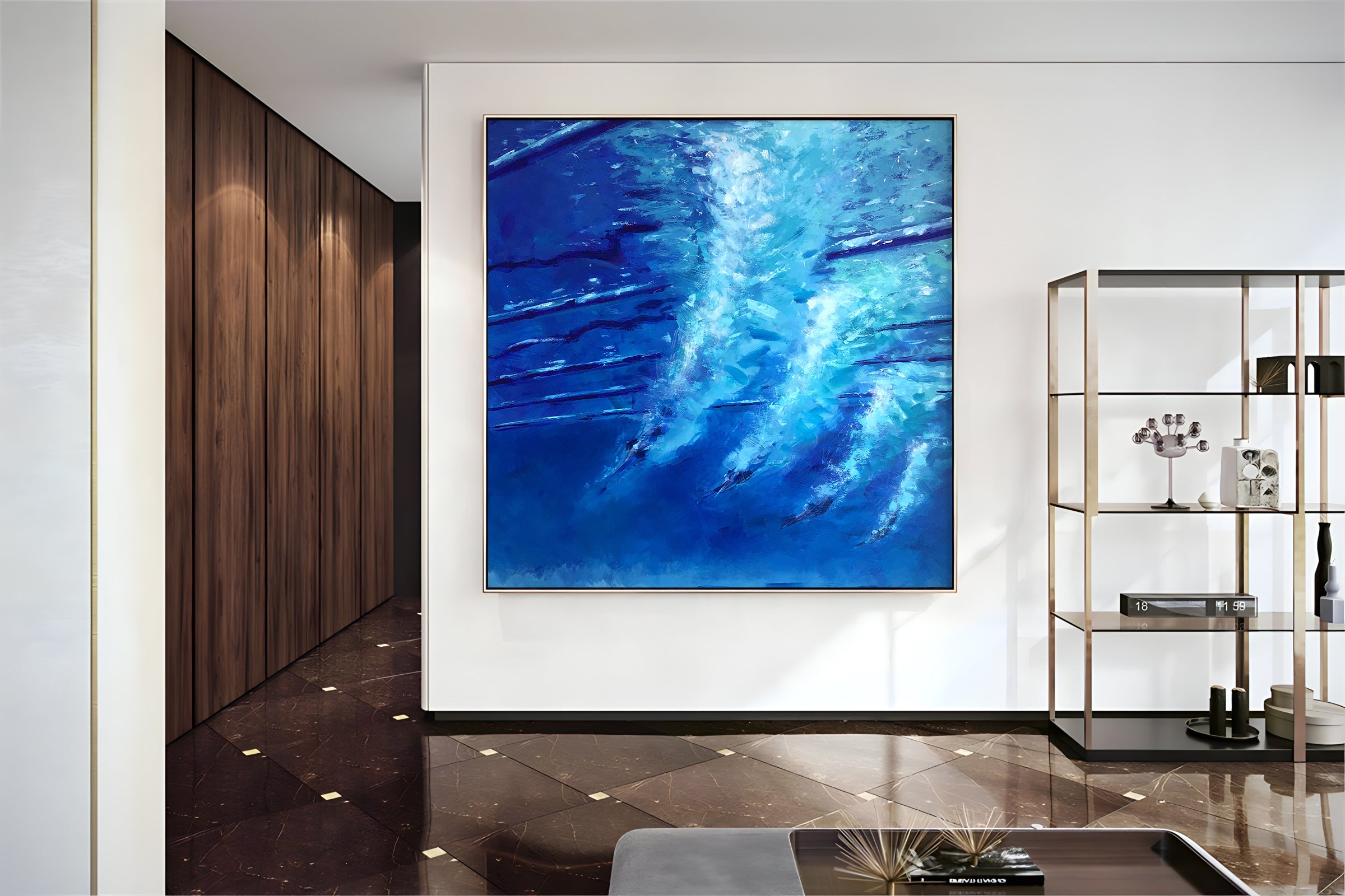 a large blue painting hanging on a wall