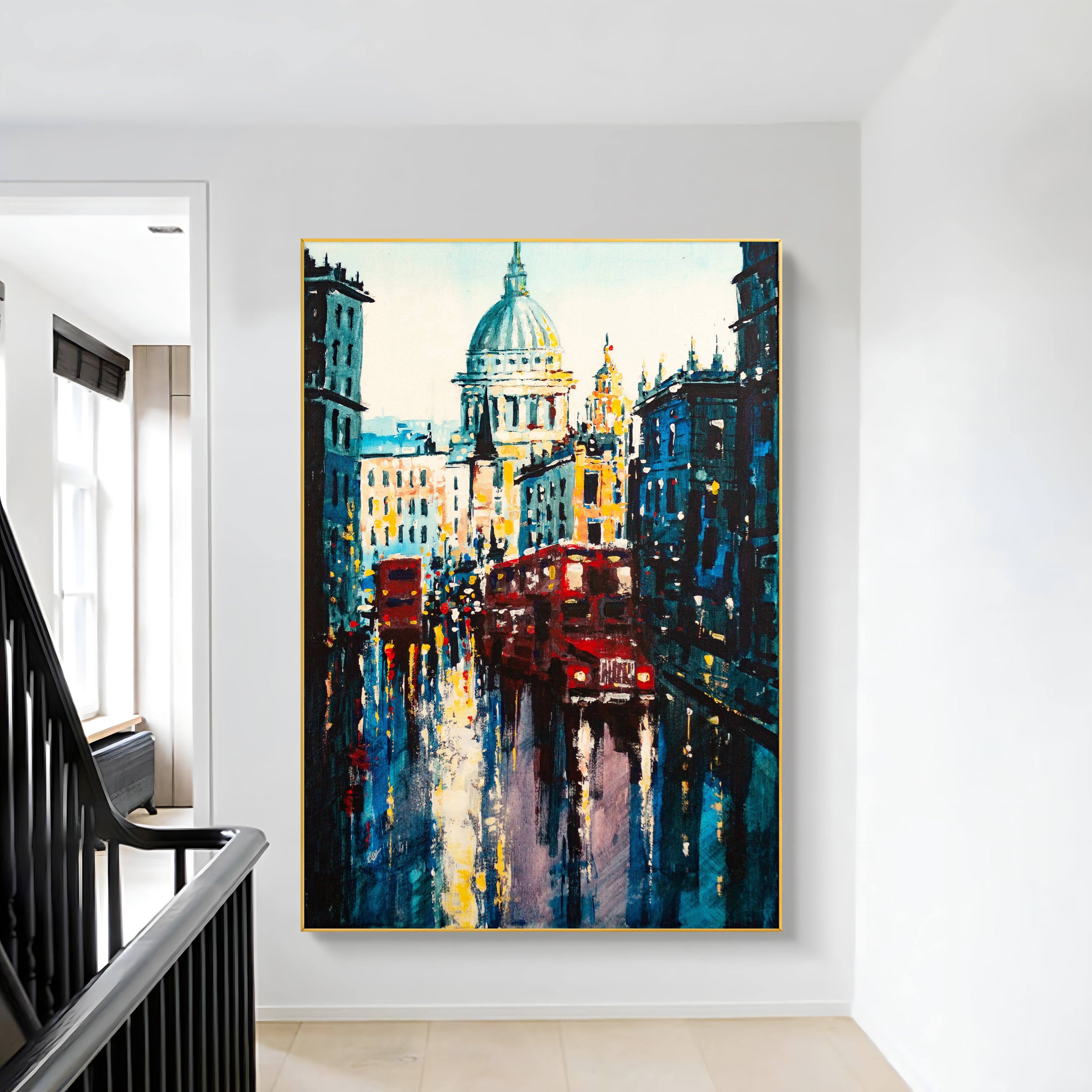 a painting hanging on a wall next to a stair case