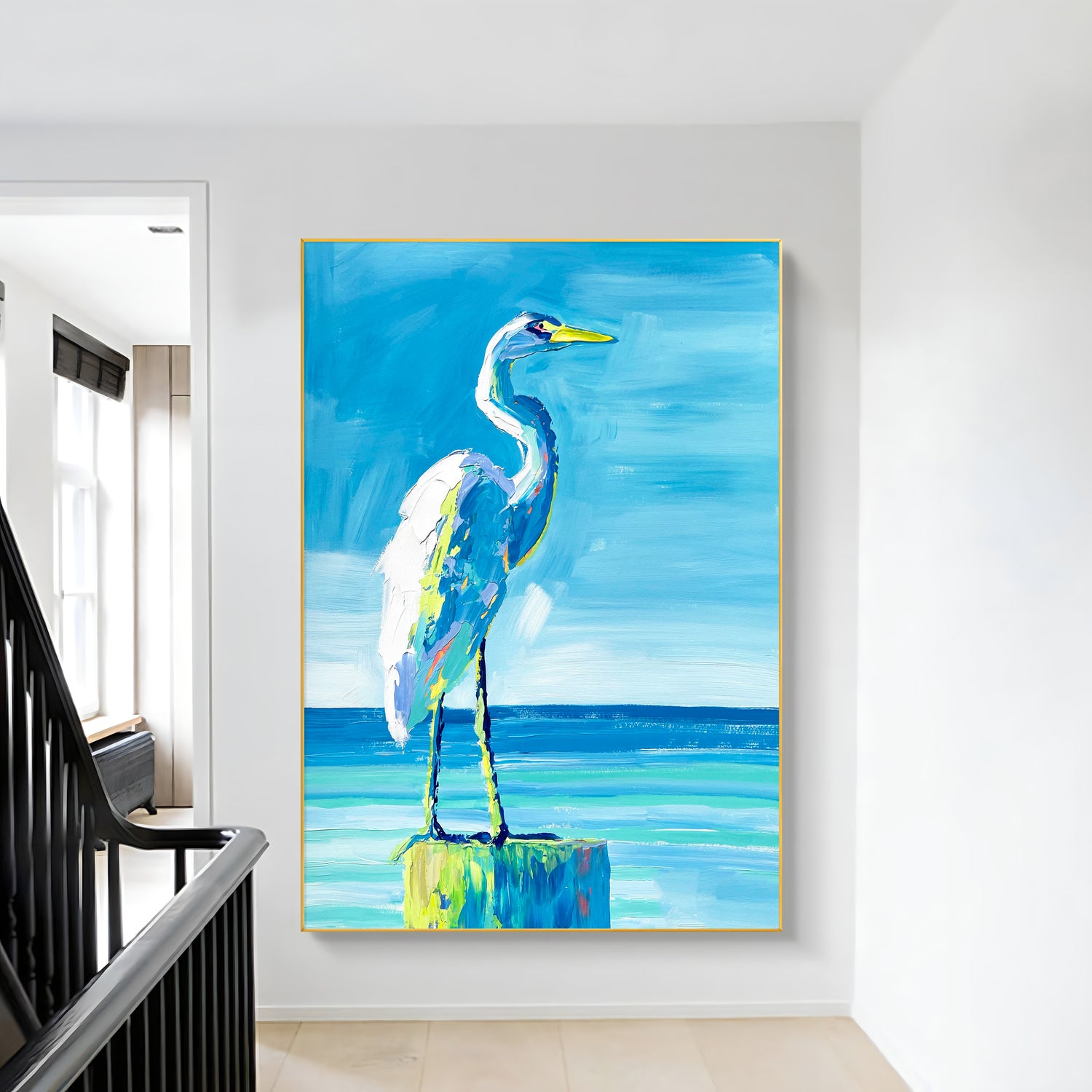 a painting of a bird is hanging on a wall