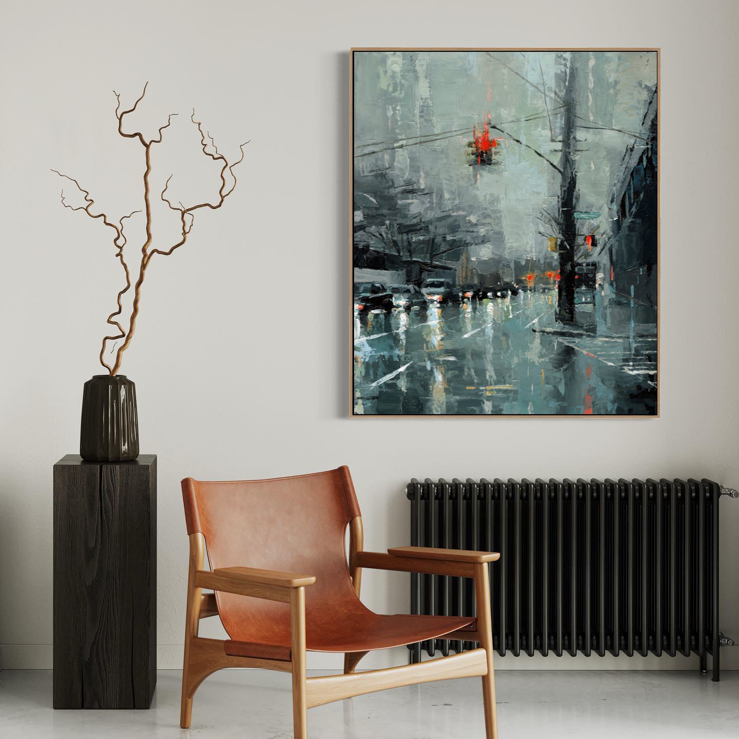 a painting on a wall next to a chair and a radiator