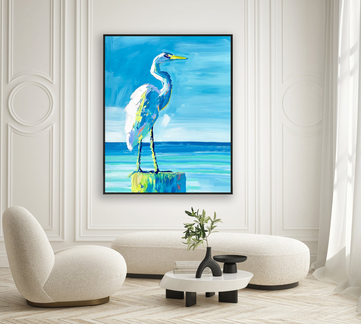 a painting of a blue heron on a white wall