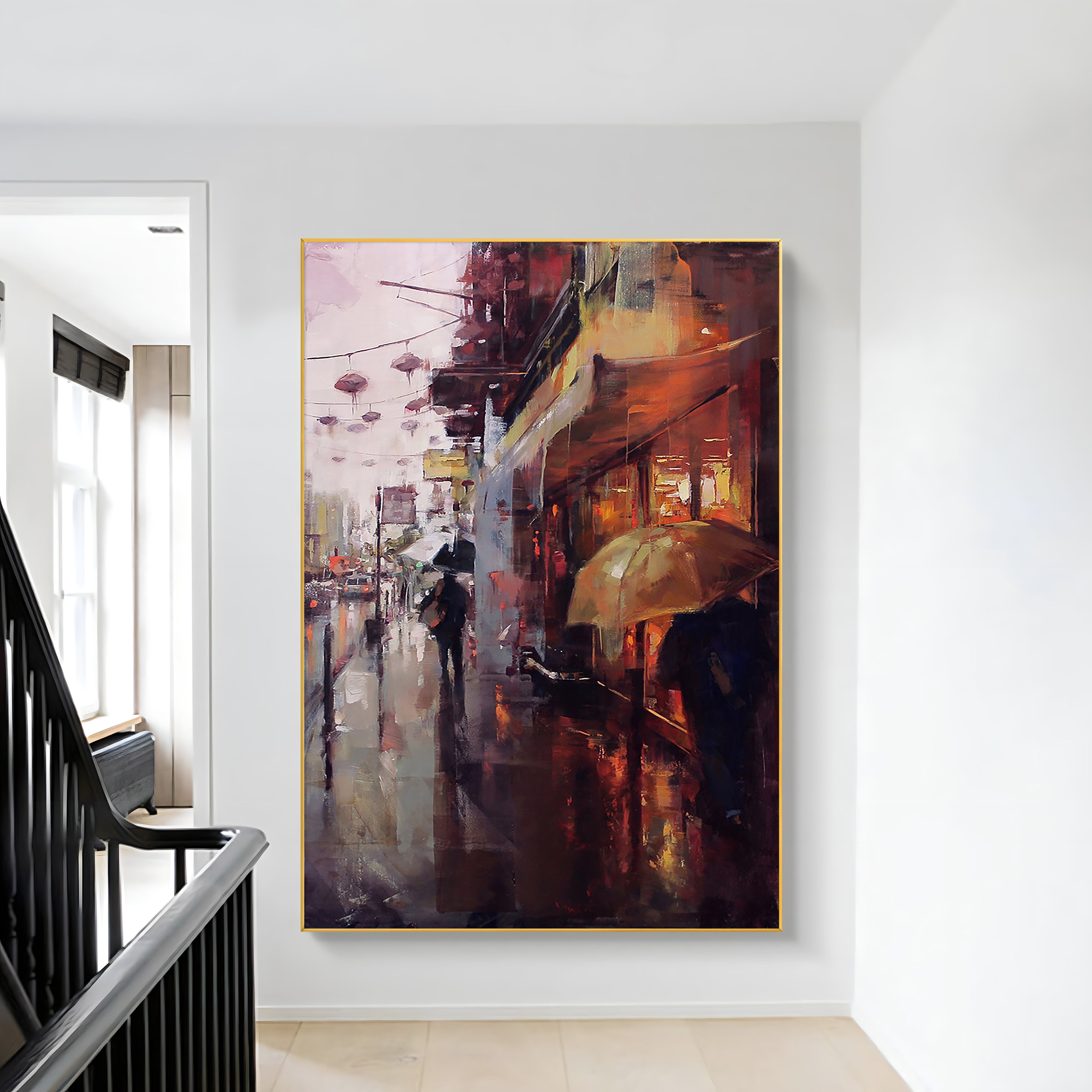 a painting hanging on a wall next to a stair case