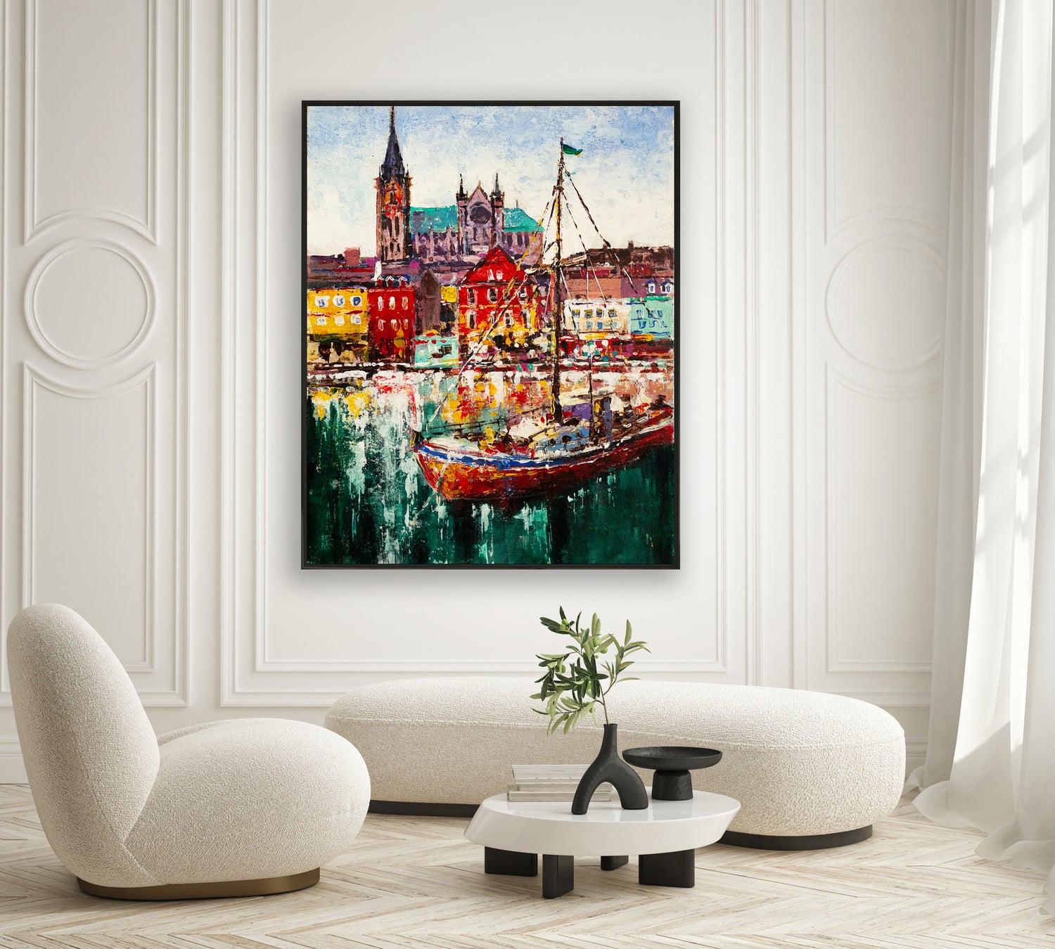 a living room with a painting of a boat in the water