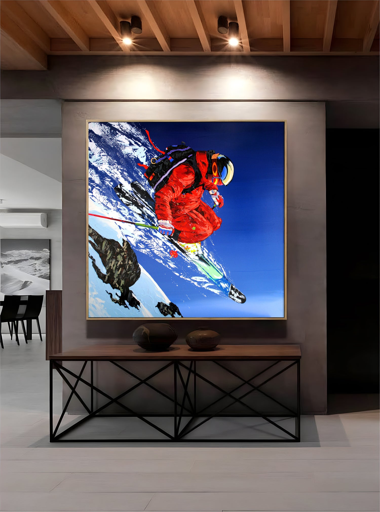 a painting of a skier is hanging on the wall