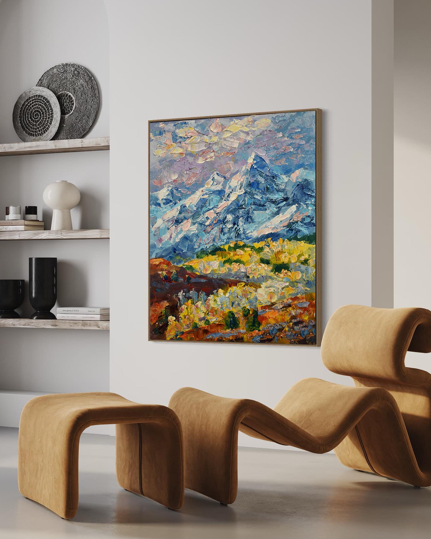 a living room with a large painting on the wall