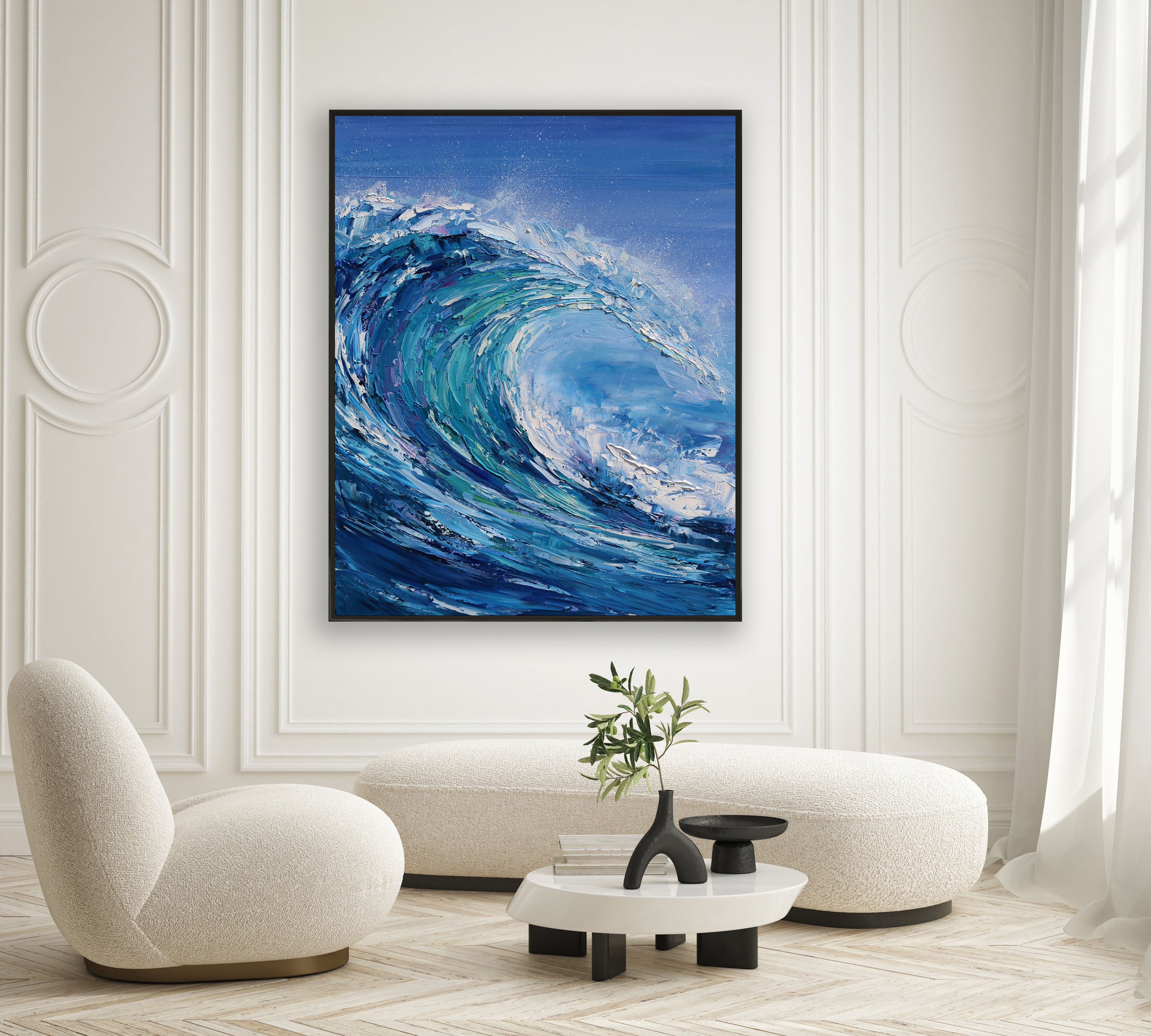 a painting of a blue wave in a white room