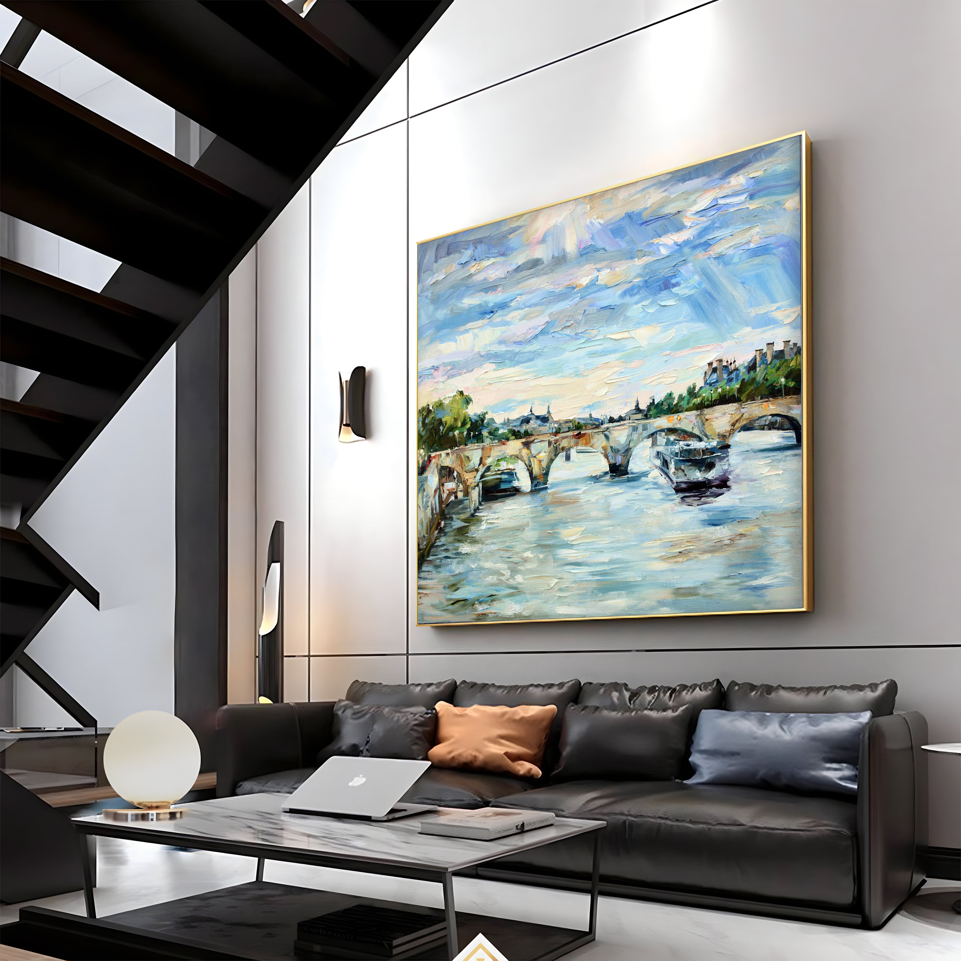 a living room with a couch and a painting on the wall