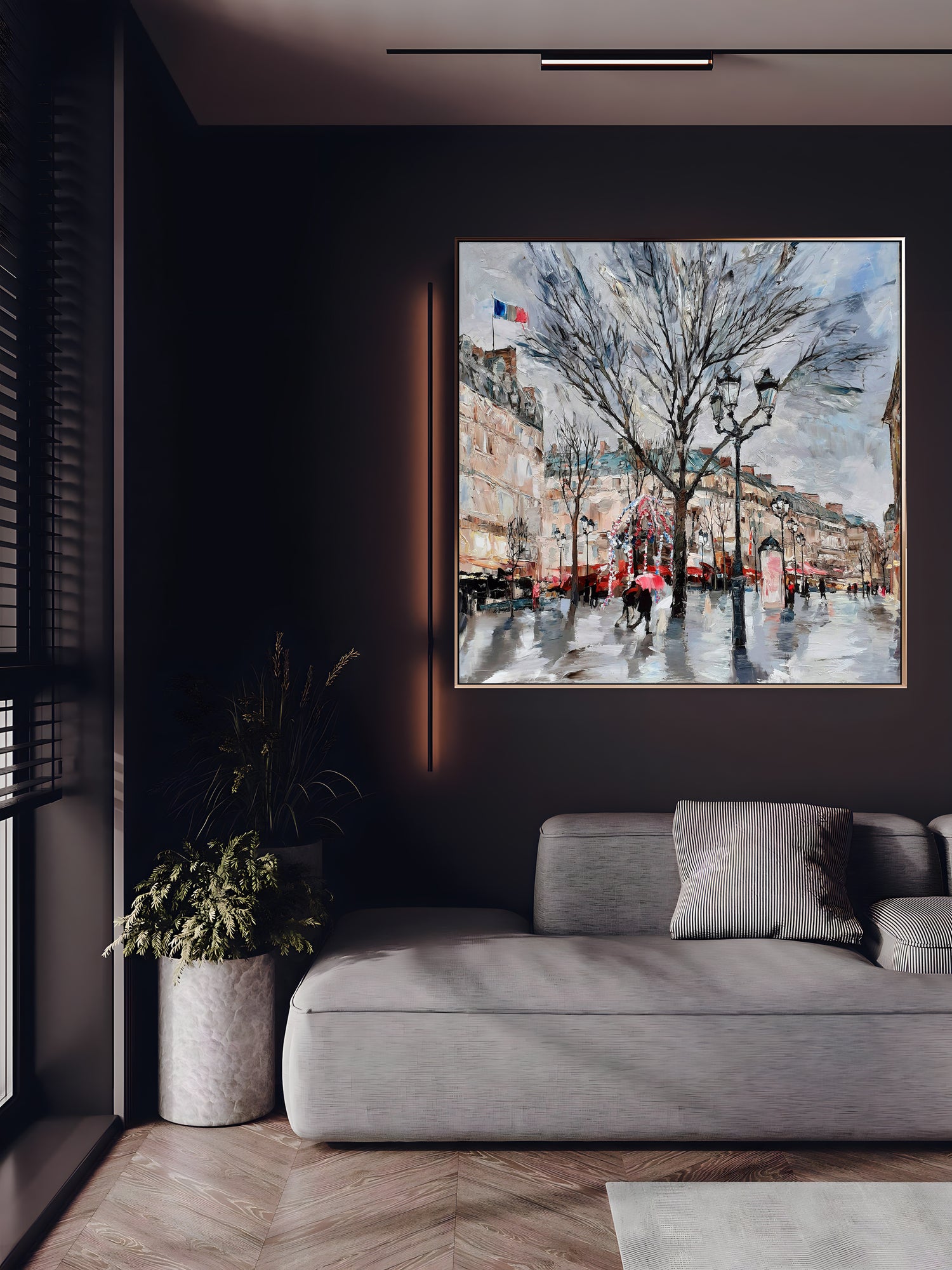 a living room with a couch and a painting on the wall