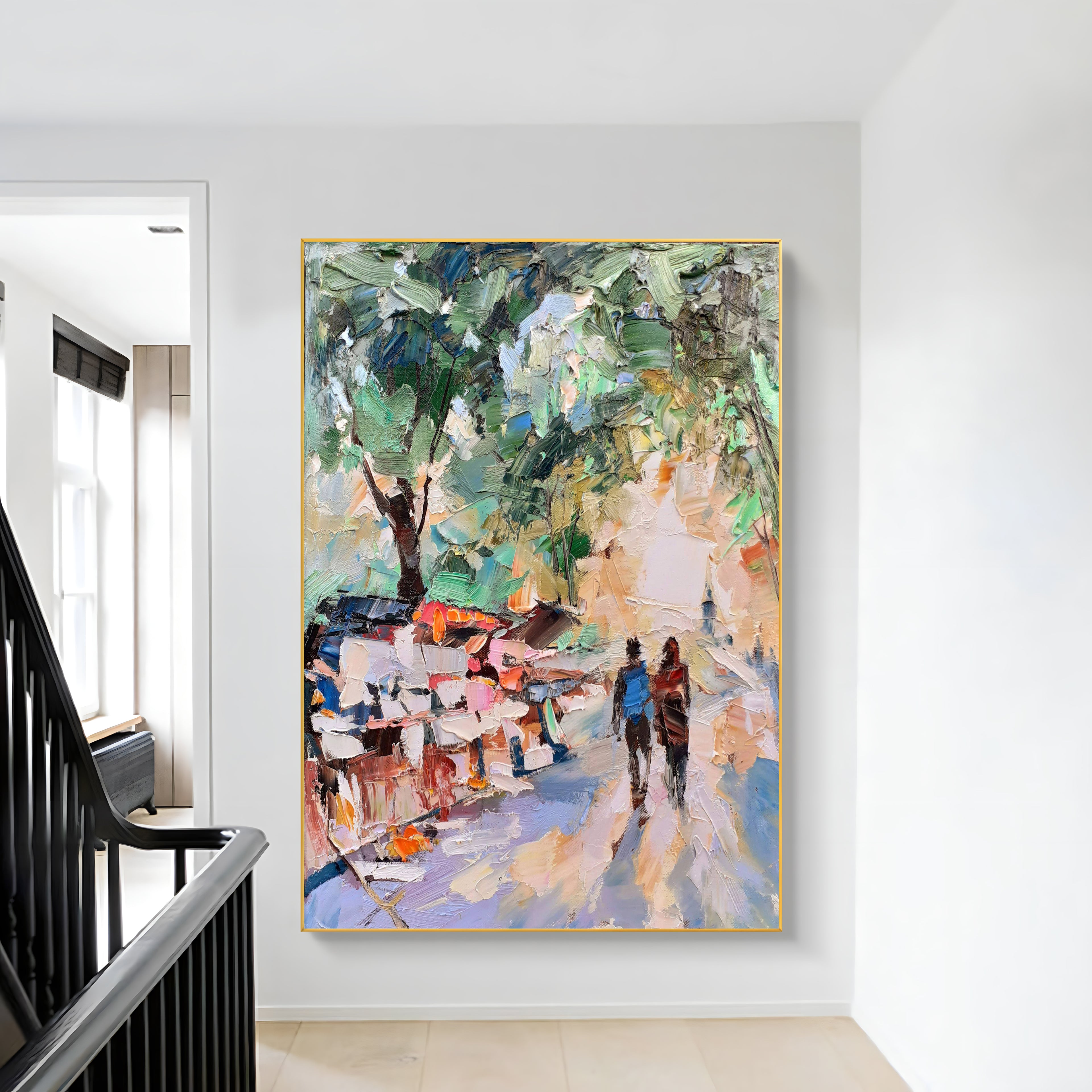 a painting hanging on a wall next to a banister