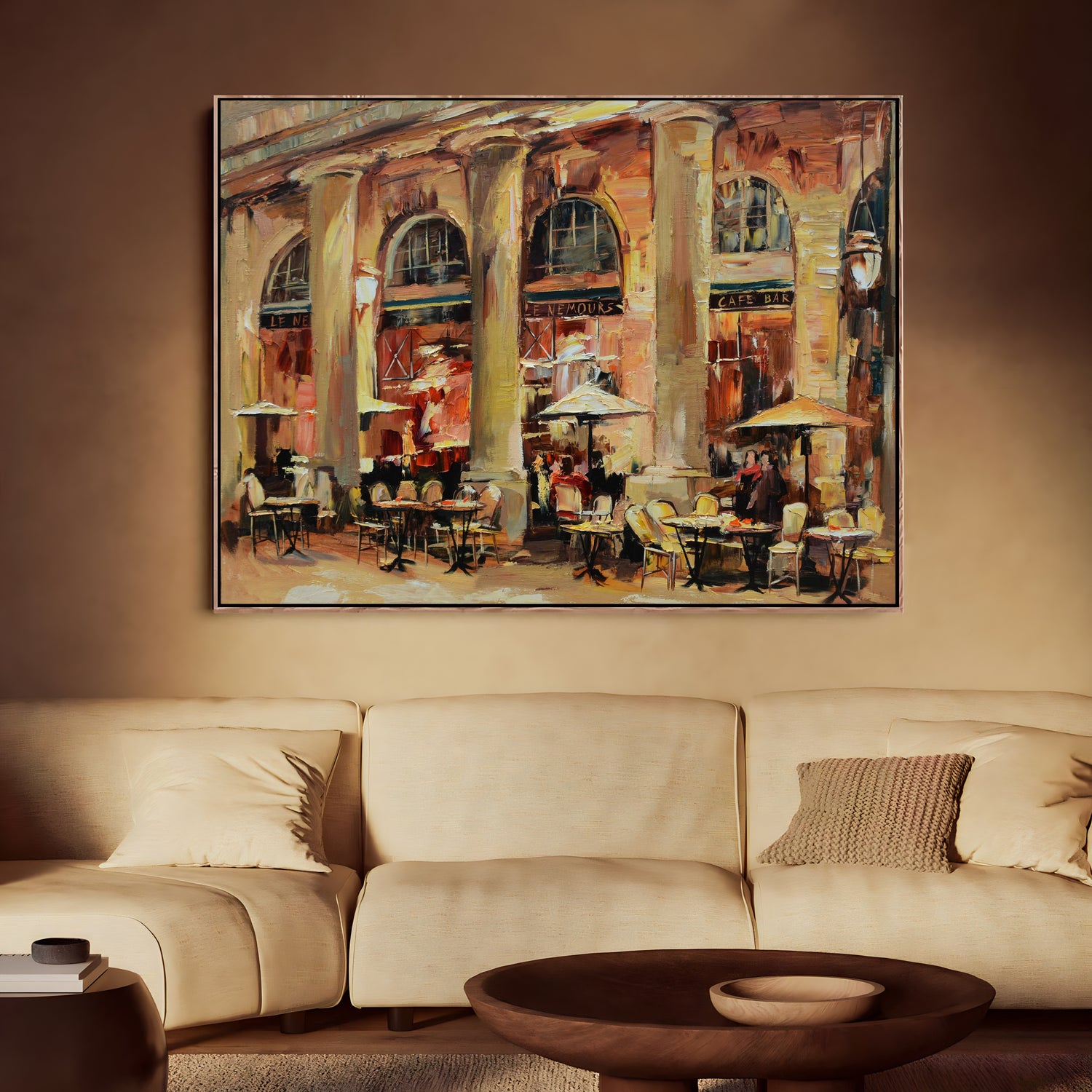 a living room with a couch and a painting on the wall