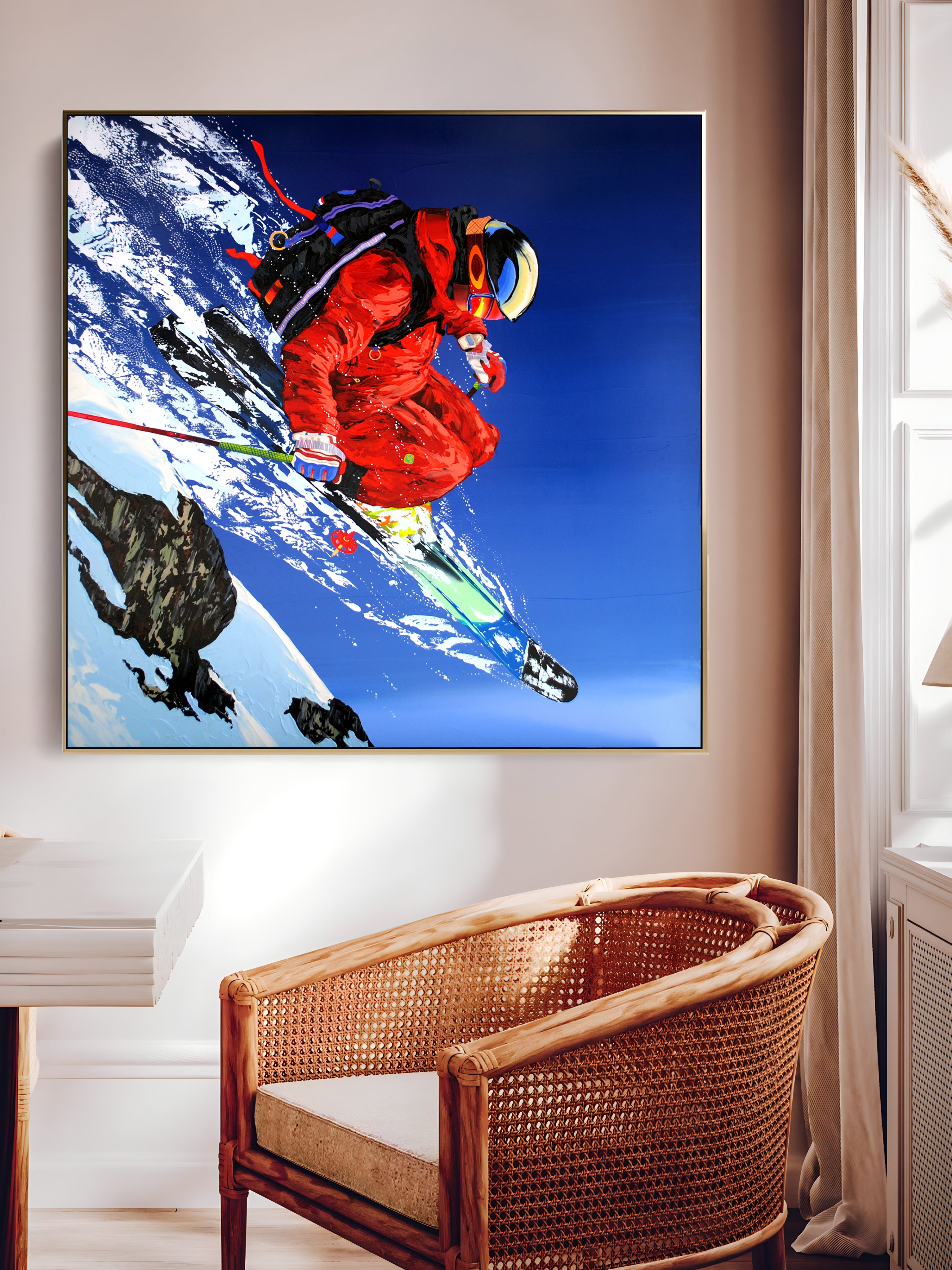 a painting of a skier is hanging in a room