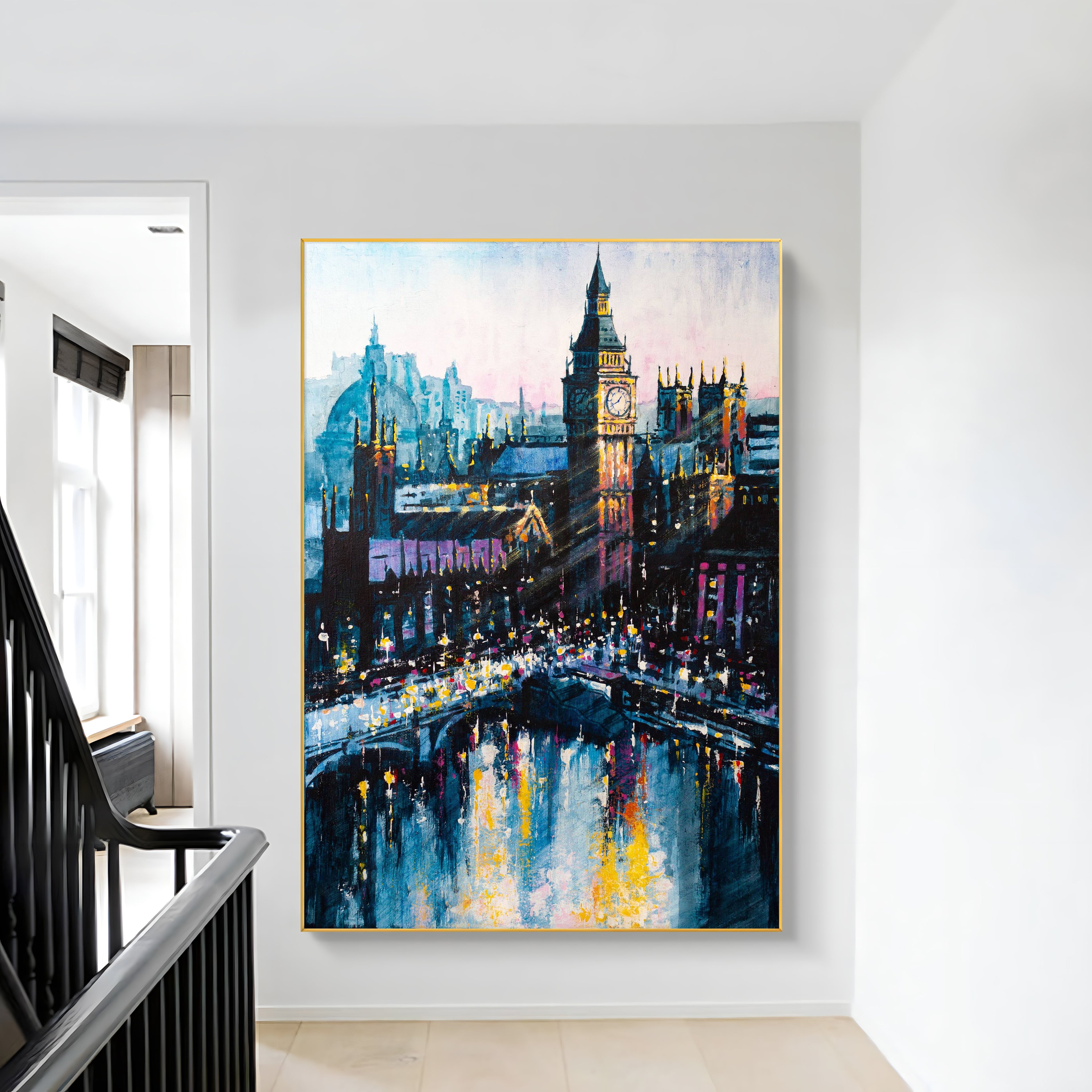 a painting hanging on a wall next to a stair case