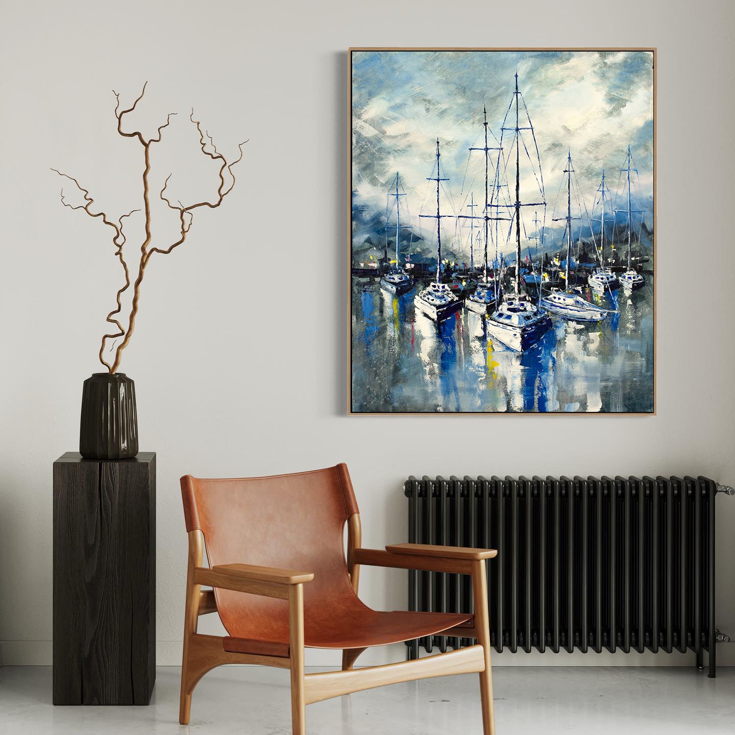 a painting on a wall above a chair next to a radiator