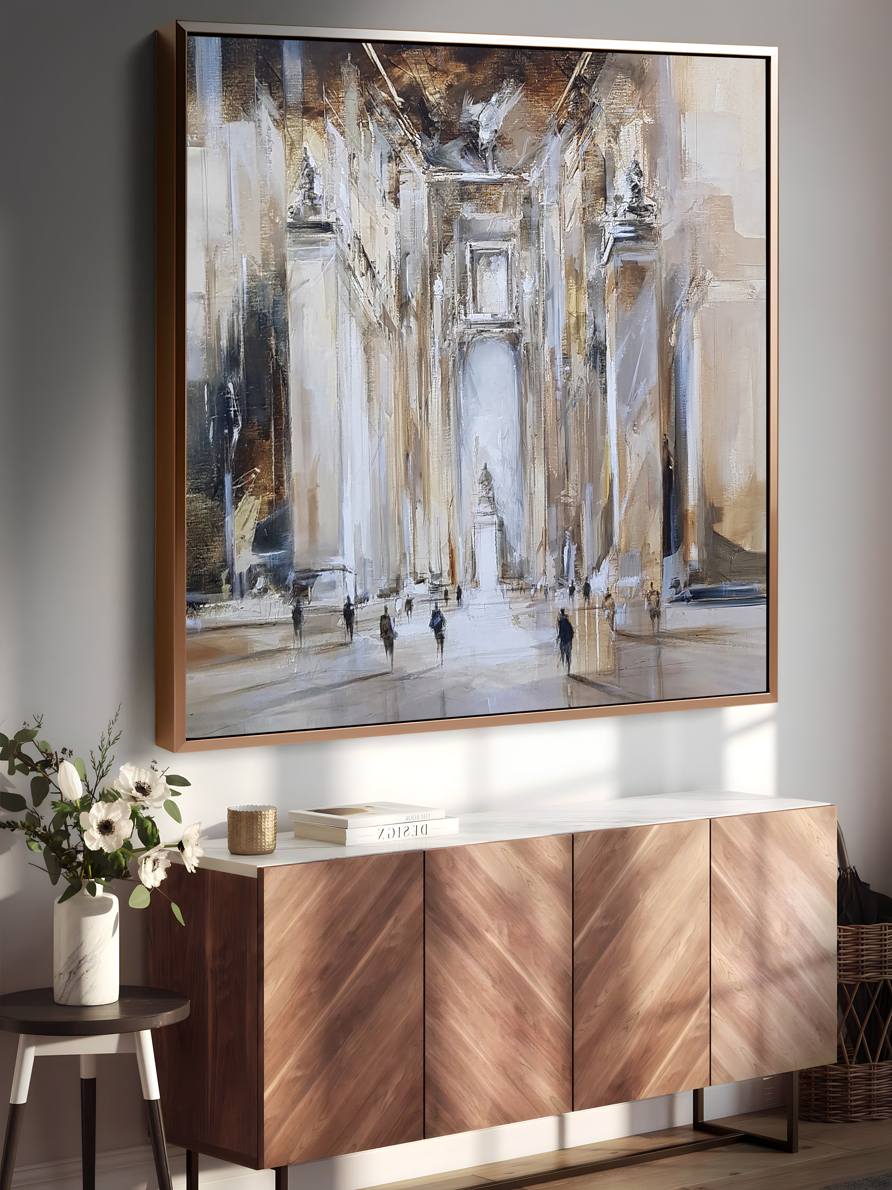 a painting hanging on a wall above a sideboard