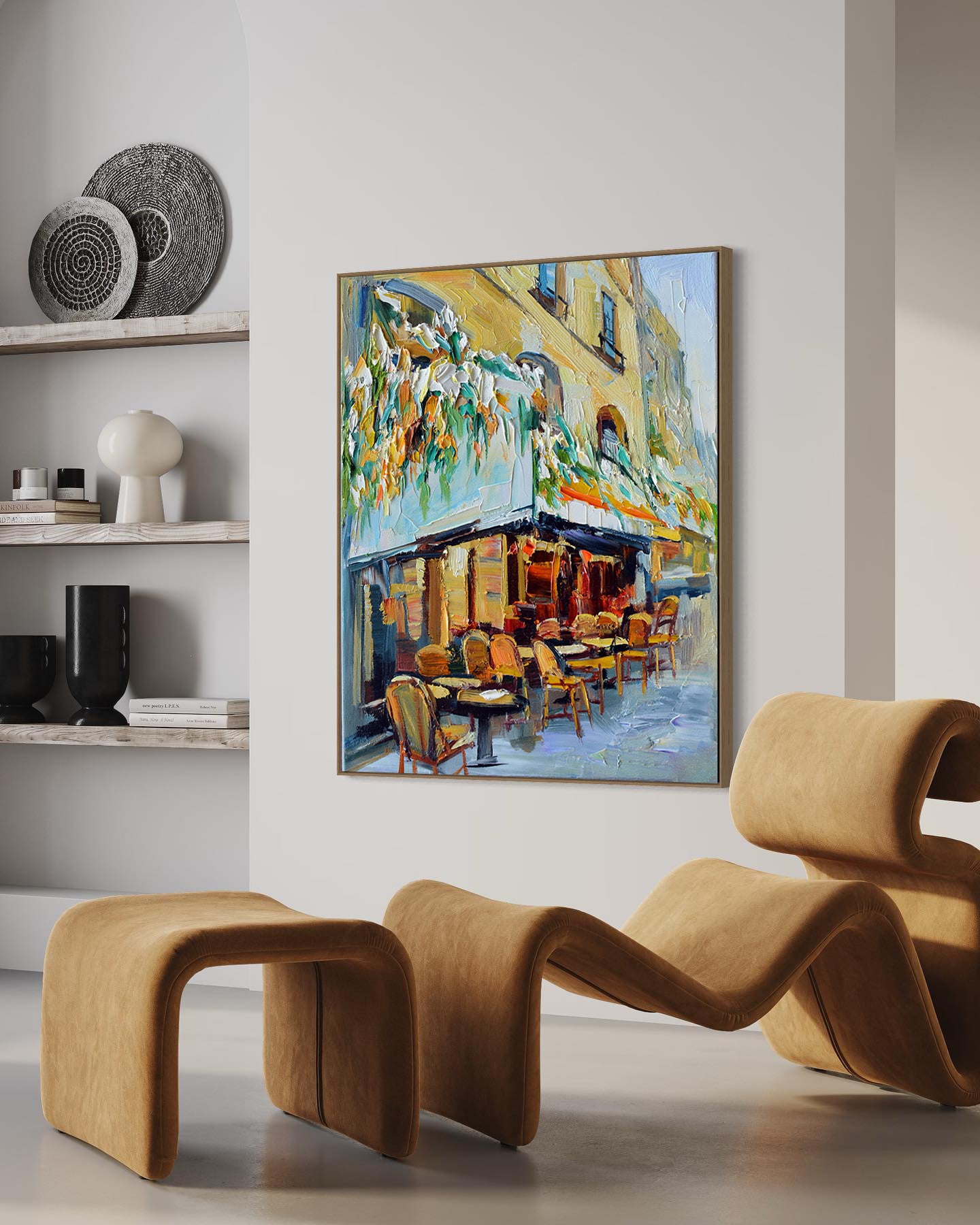 a living room with a painting on the wall