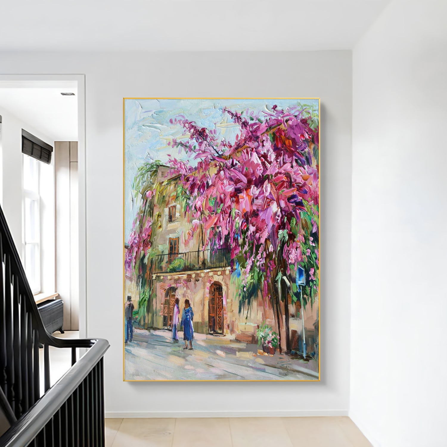 a painting hanging on a wall next to a stair case