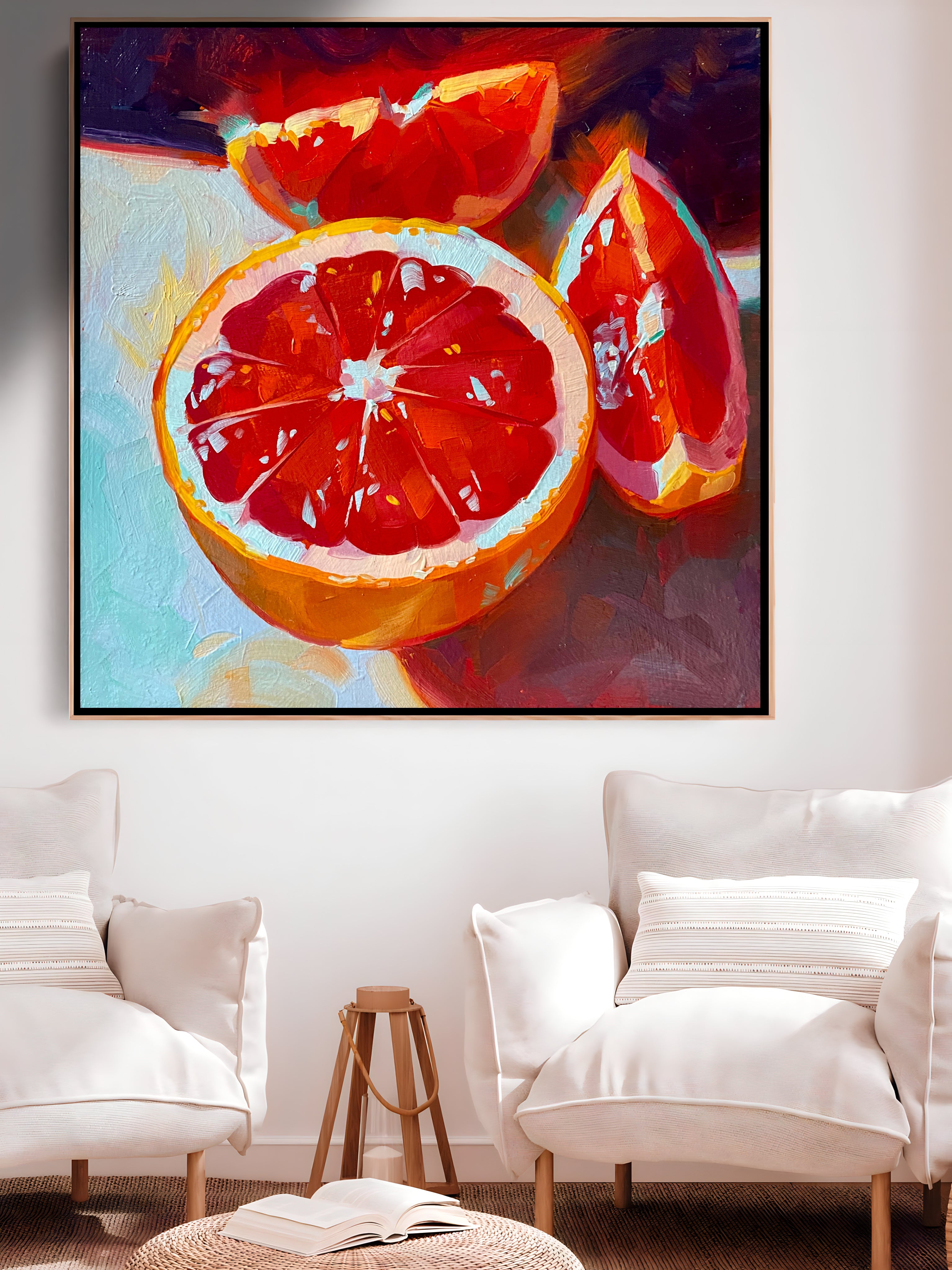 a painting of a grapefruit on a white wall