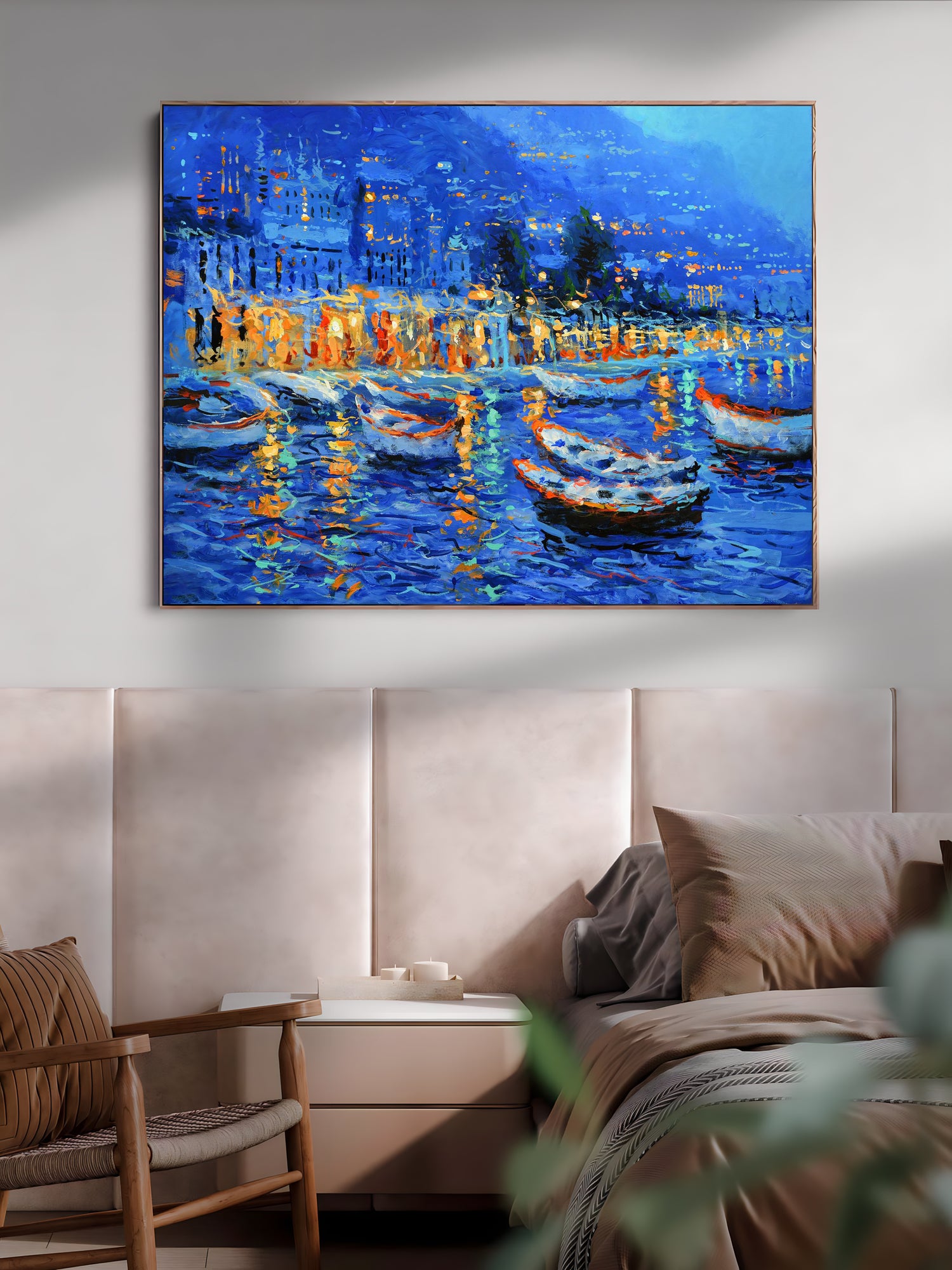 a bedroom with a painting of boats in the water