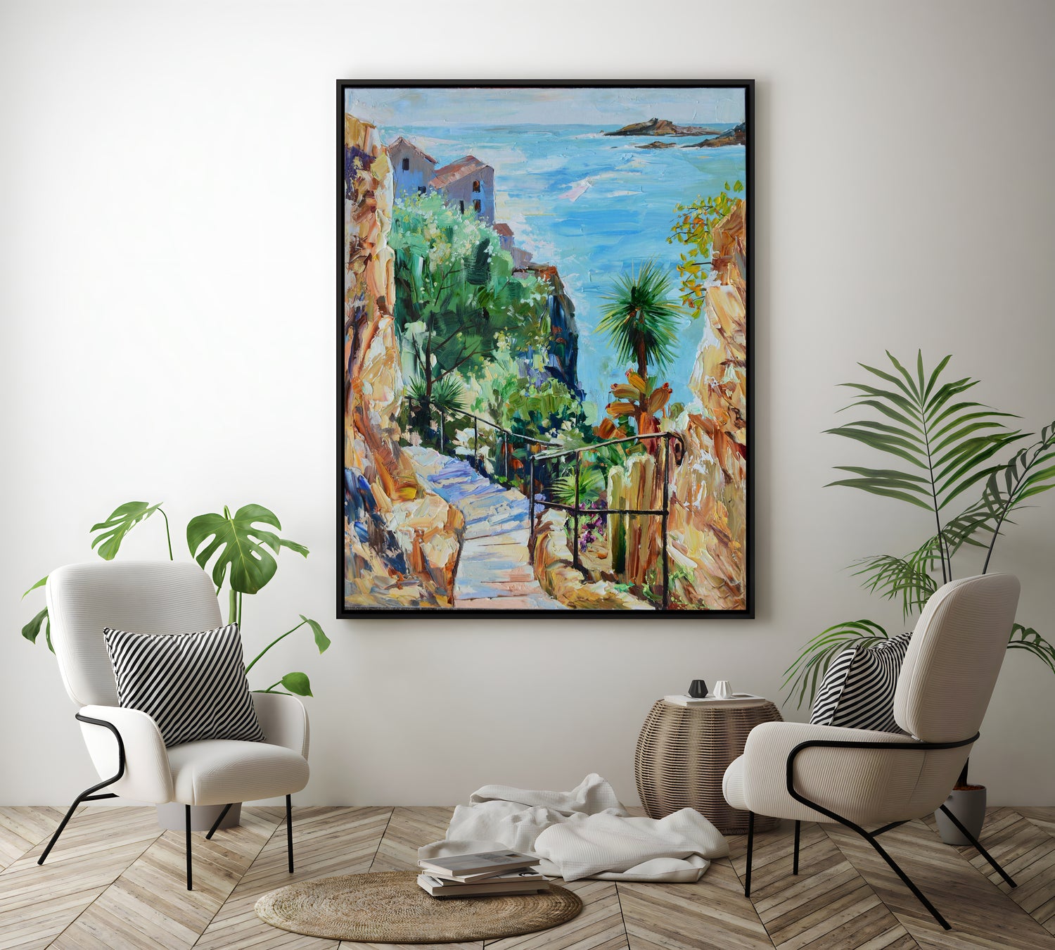 a living room with two chairs and a painting on the wall