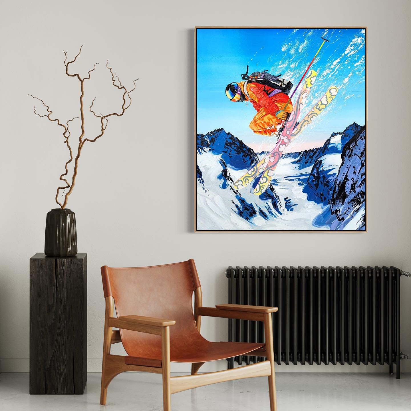 a painting of a skier is hanging on the wall