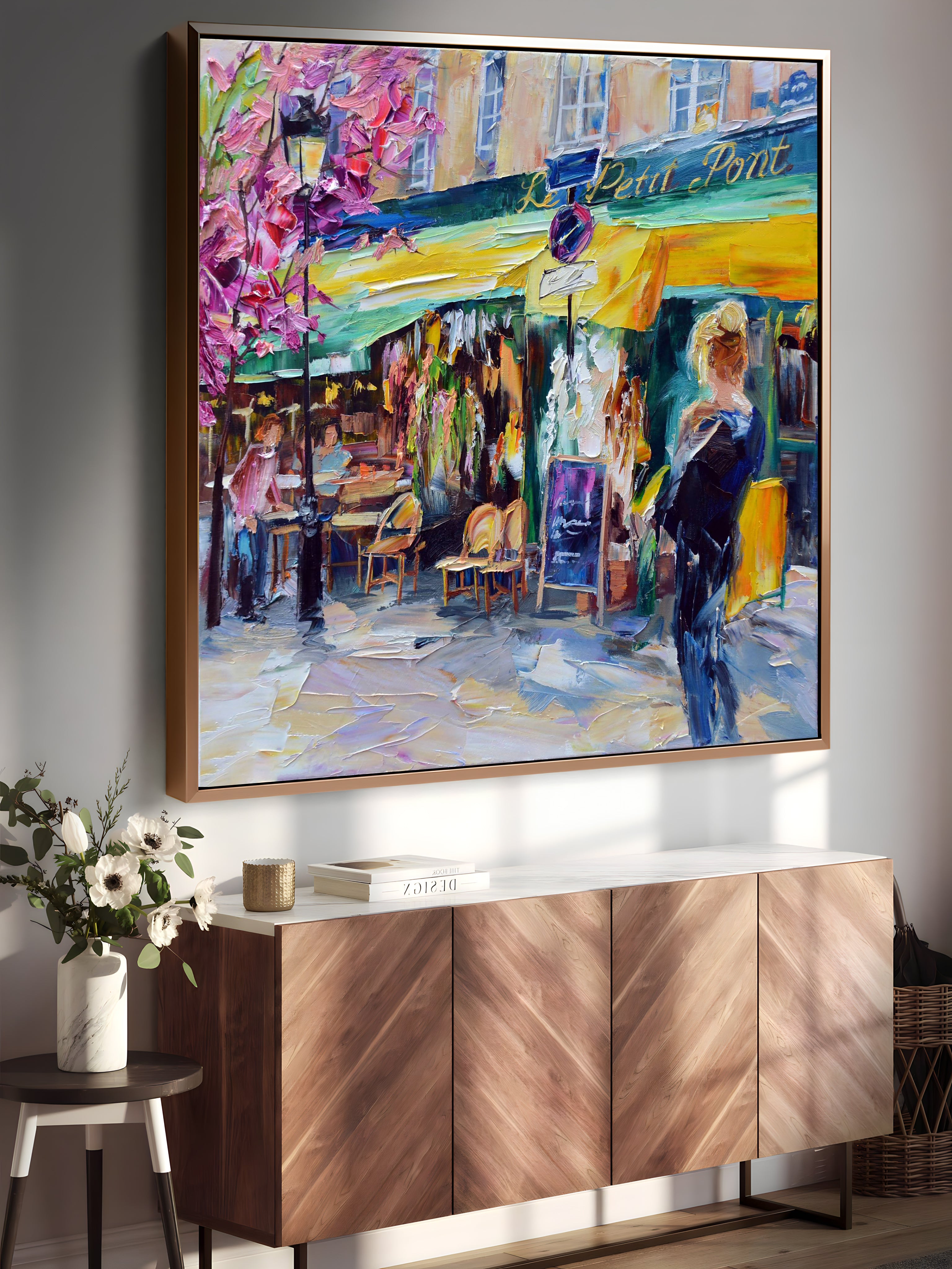 a painting hanging on a wall above a buffet