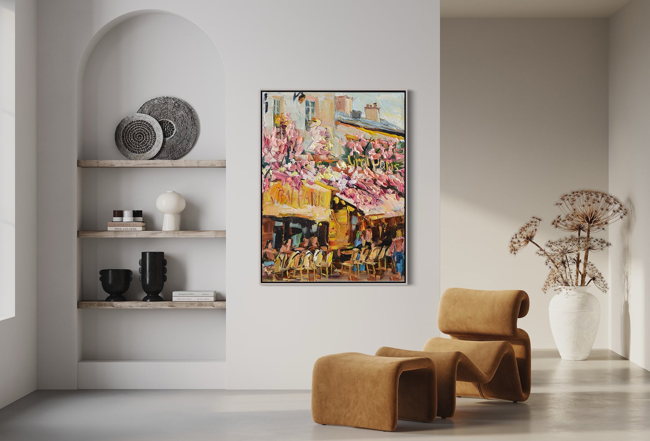 a living room with a painting on the wall