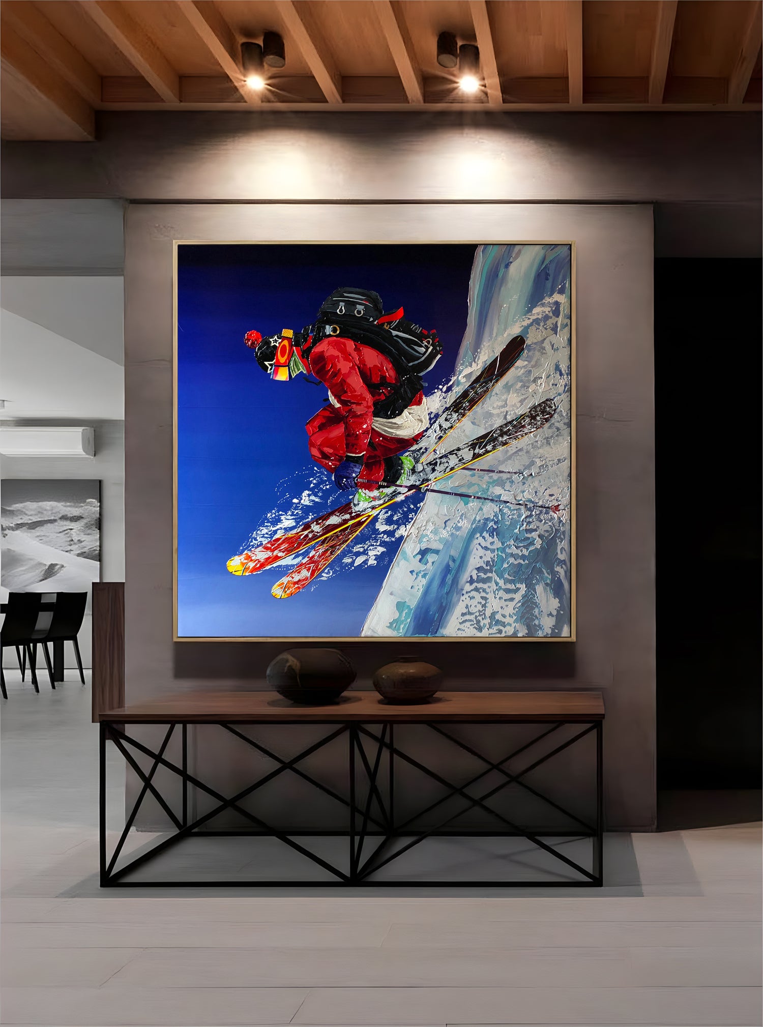 a painting of a skier is hanging on the wall