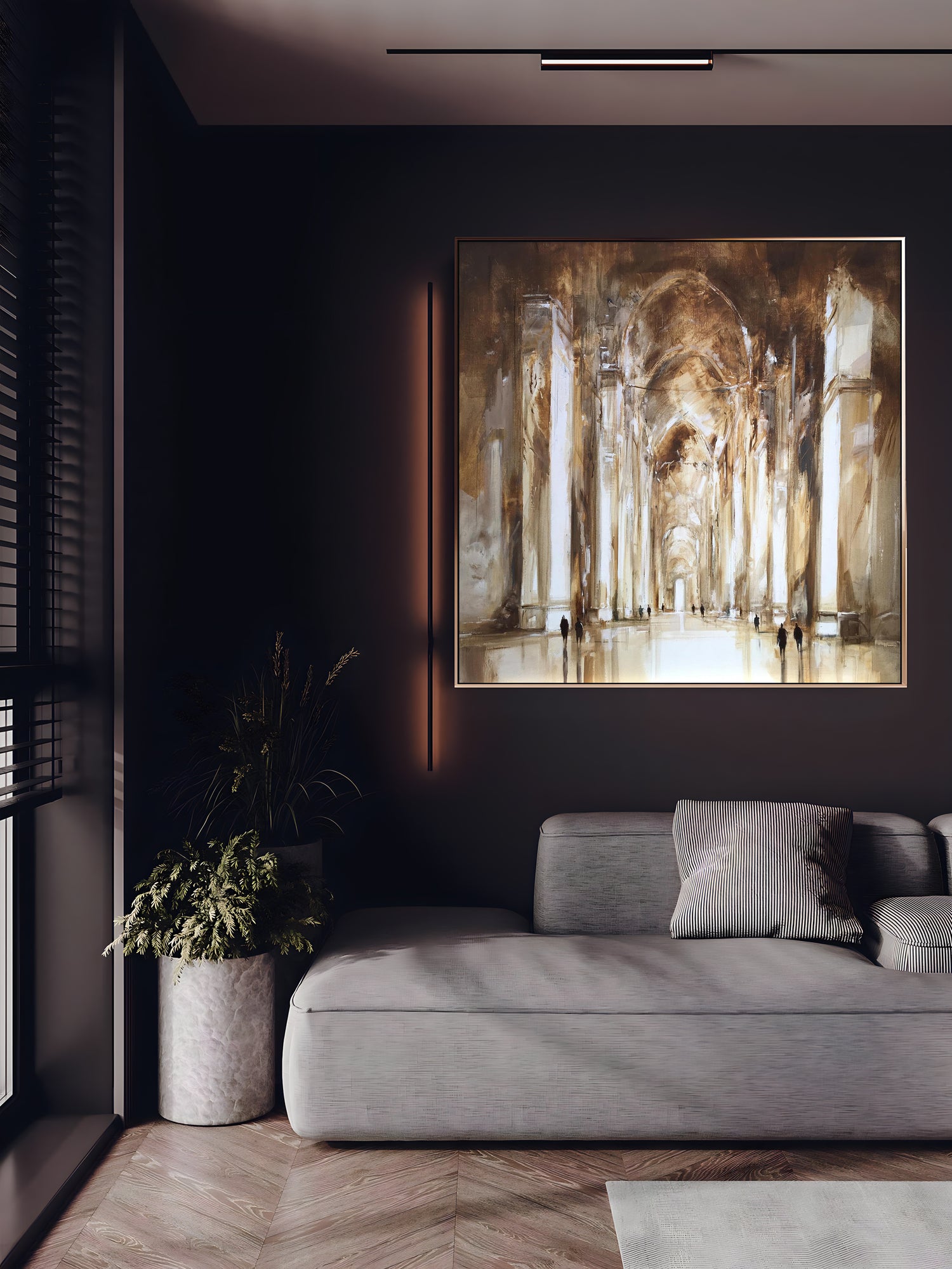 a living room with a couch and a painting on the wall