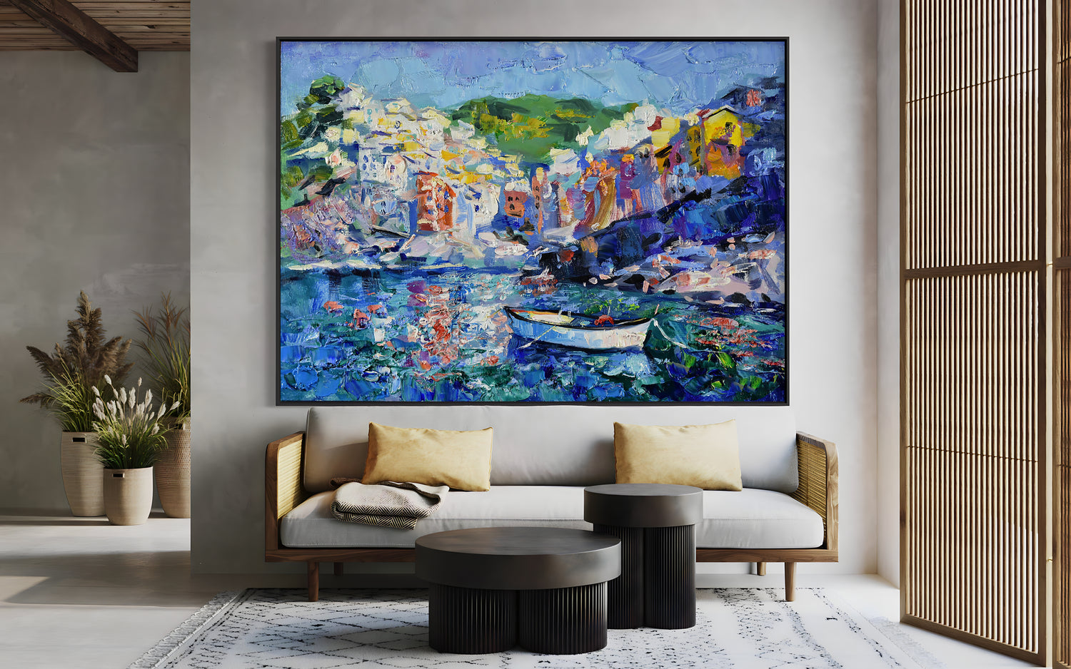 a living room with a painting on the wall