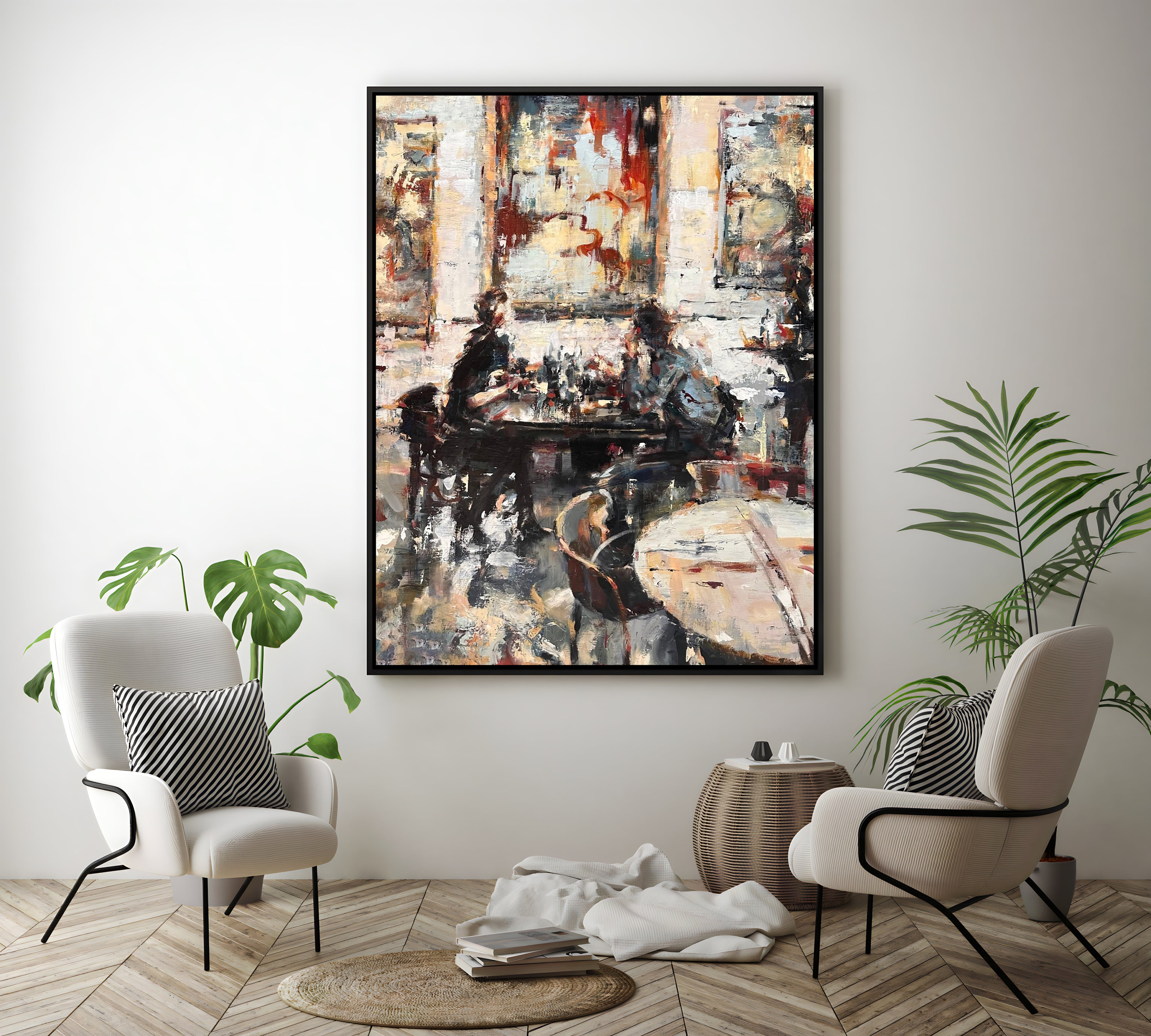 a living room with two chairs and a painting on the wall
