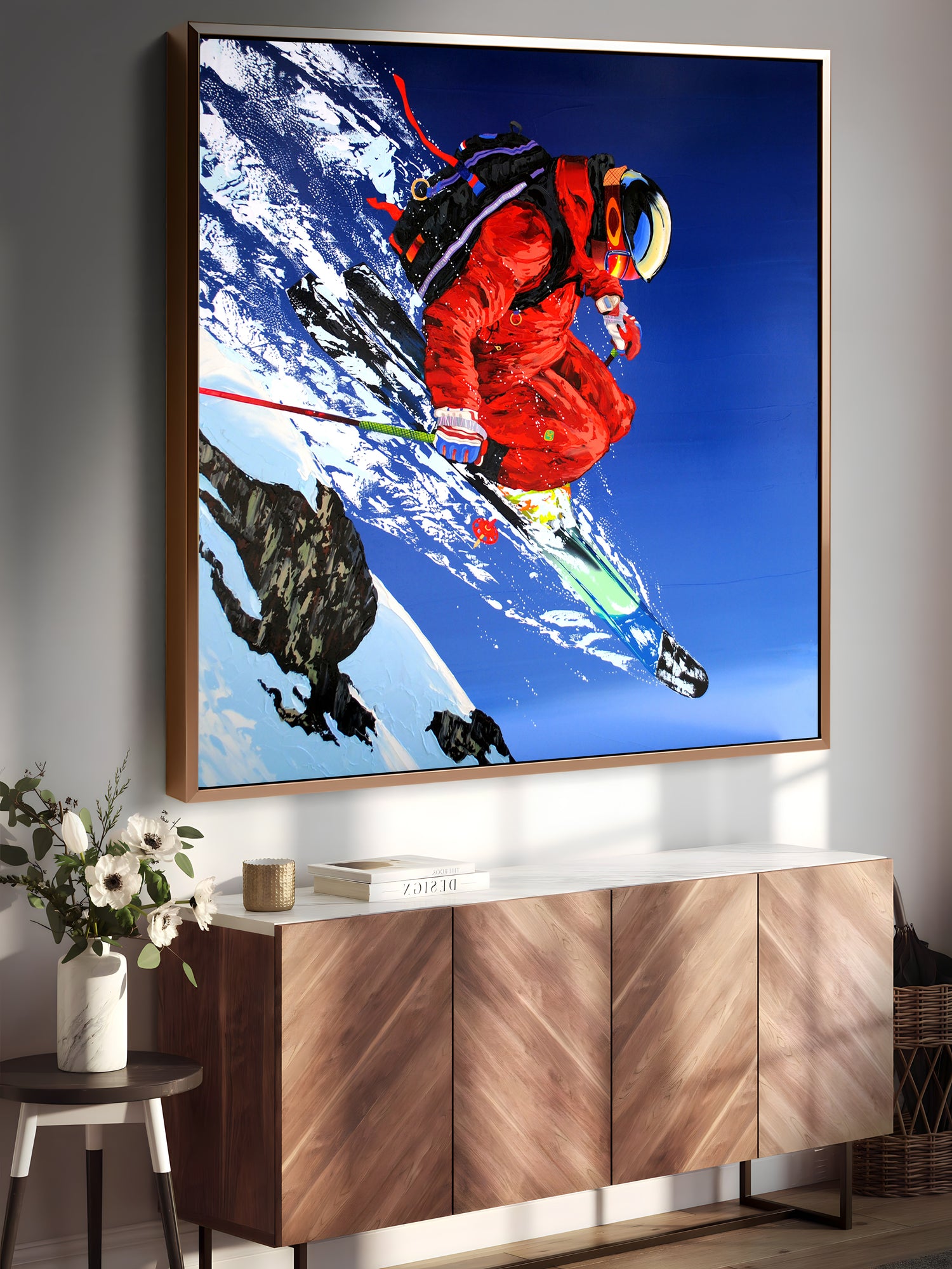 a painting of a skier is hanging on a wall