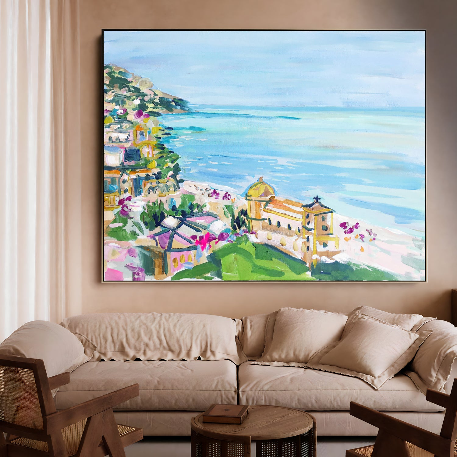 a living room with a painting on the wall