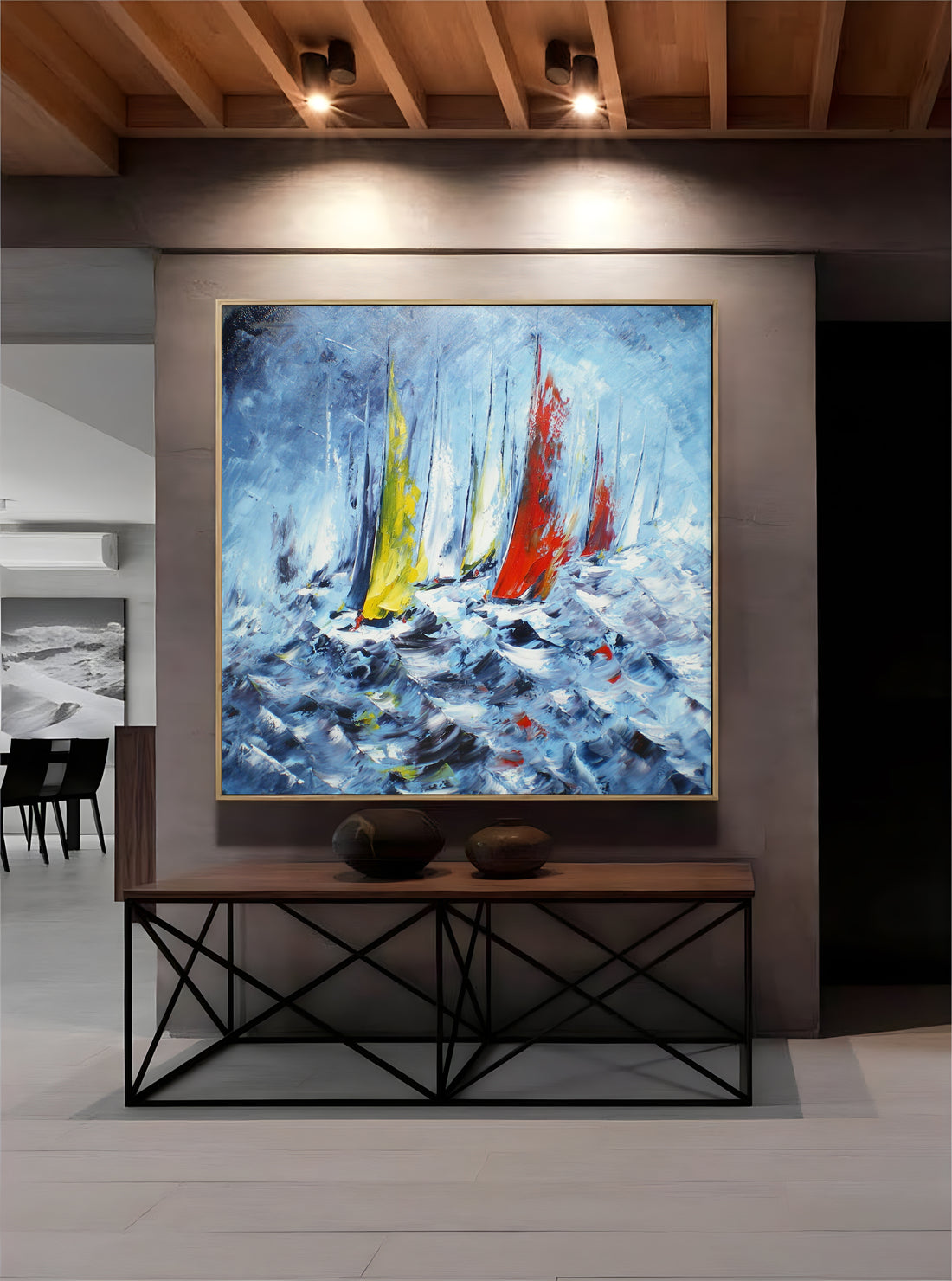 a painting of sailboats in a large room